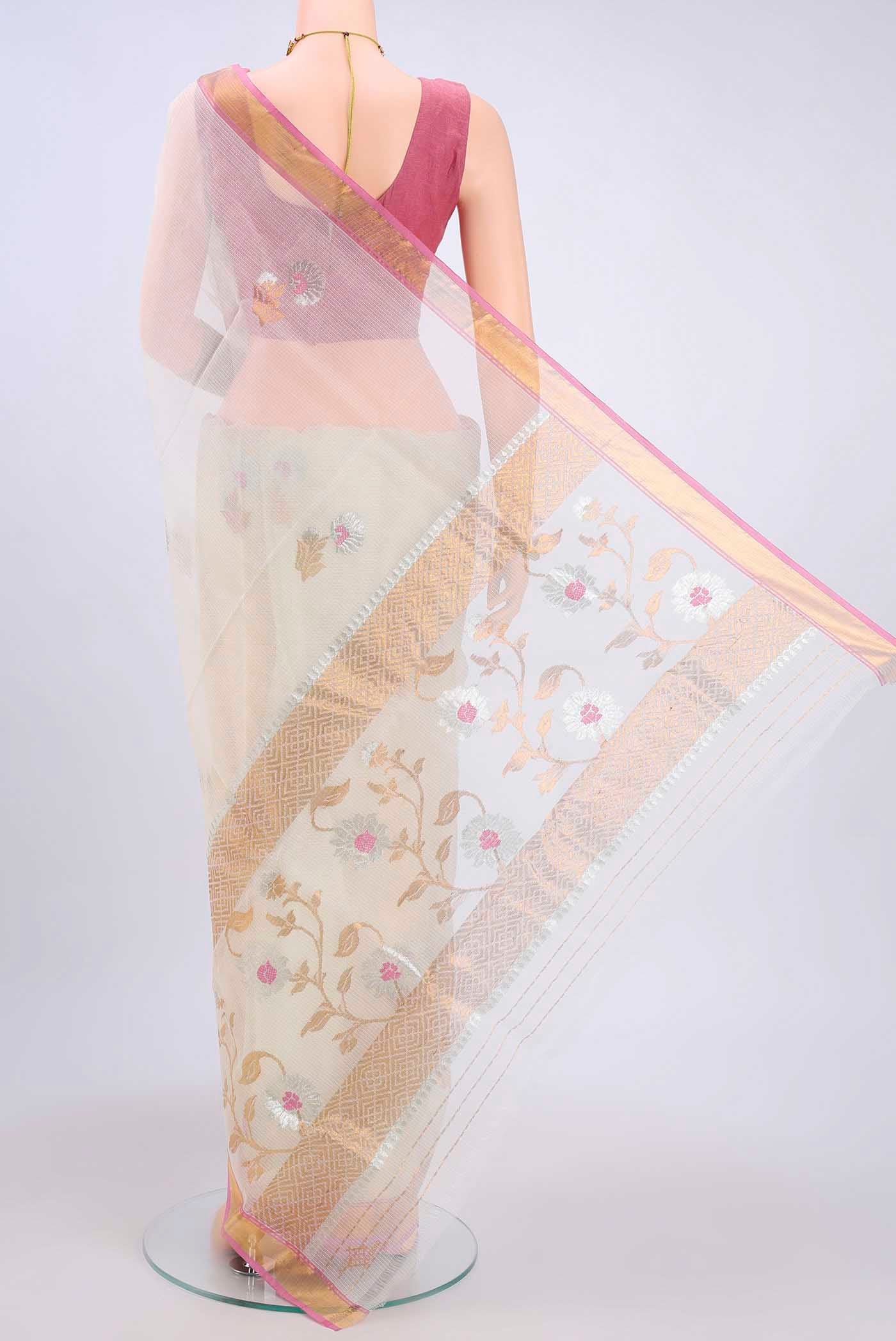 Flat view of Pure Silk Pure Zari Off White Kota Saree with Zari And Thread Butta on the body and Zari Border