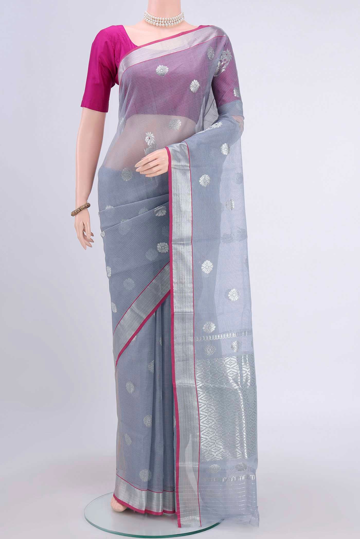 Pure Silk Pure Zari Grey Kota Saree with Zari Butta on the body and Zari Border displayed on a mannequin