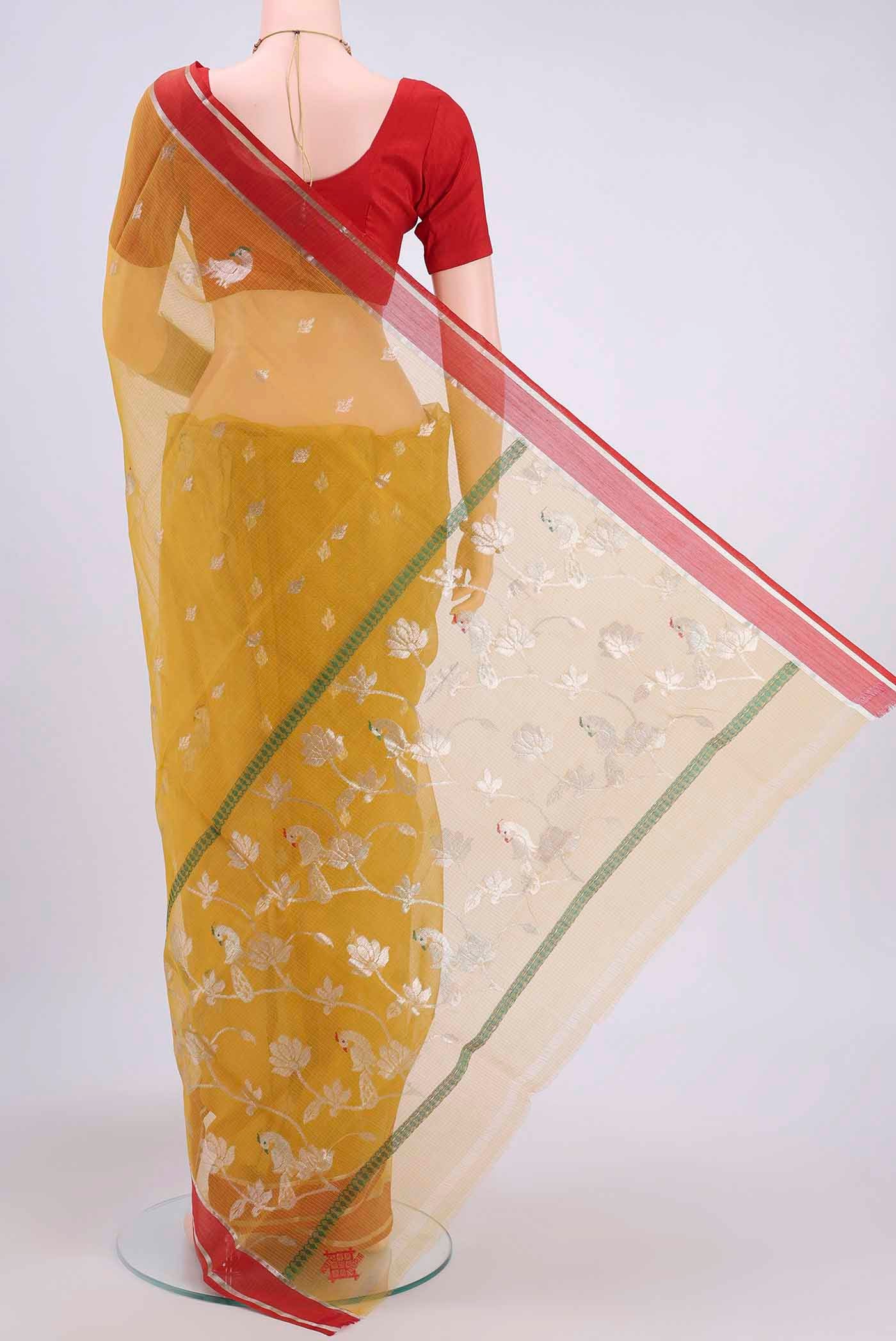 Flat view of Pure Silk Pure Zari Mustard Kota Saree with Zari And Thread Butta on the body and Zari Border