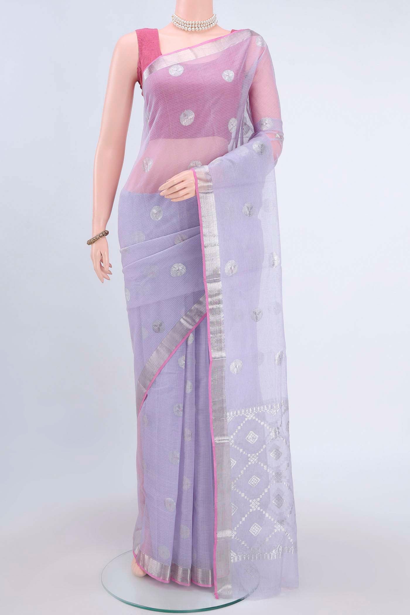 Pure Silk Pure Zari Lilac Kota Saree with Zari Butta on the body and Zari Border displayed on a mannequin