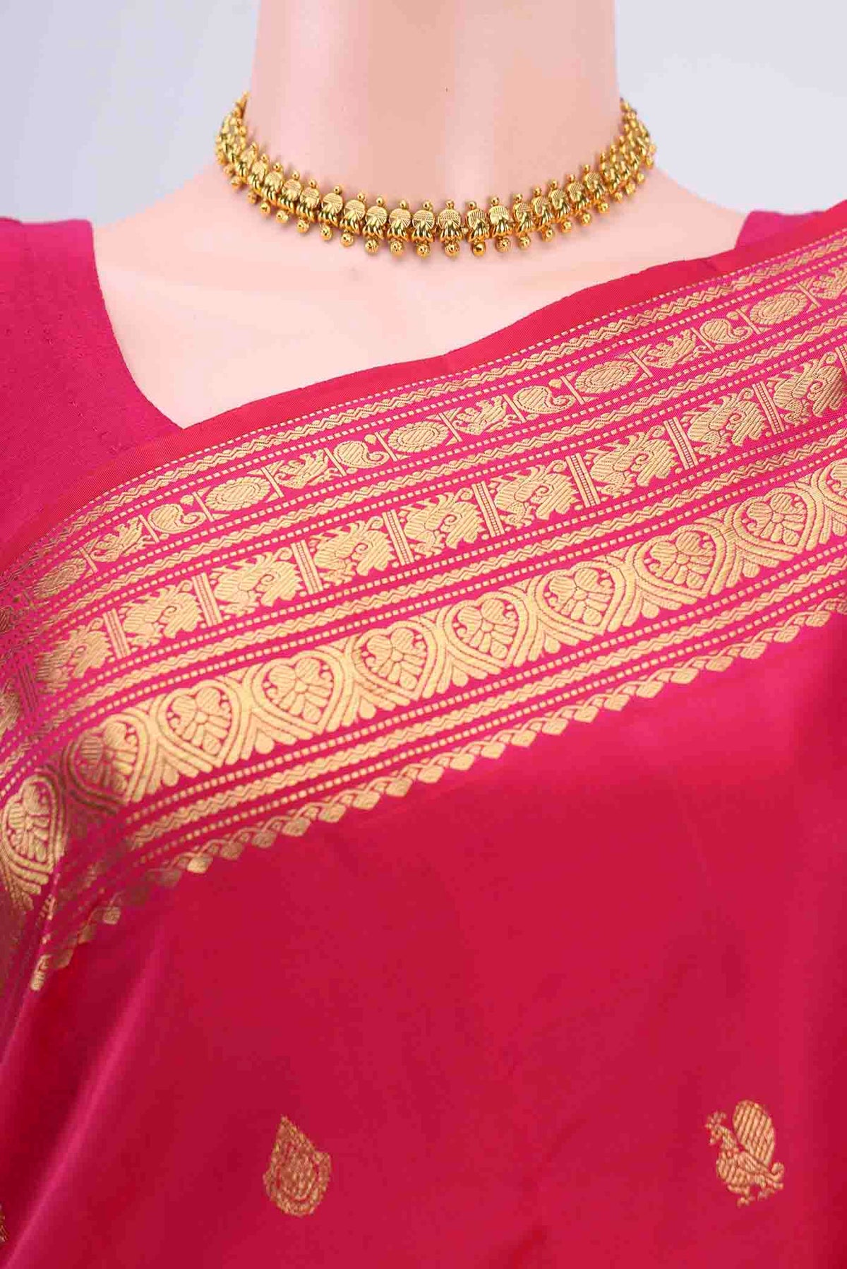 Border image of Dark Pink Kanchipuram Silk Saree with Zari Butta on the body and Zari Border