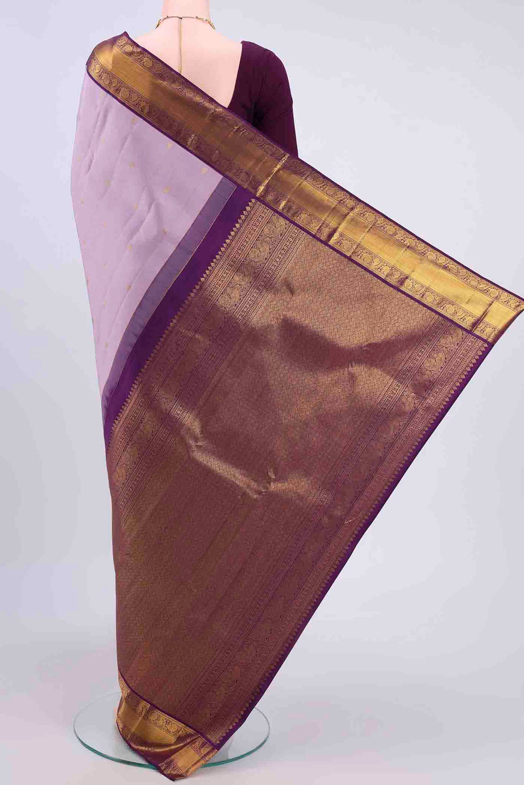 Flat view of Lavender Kanchipuram Silk Saree with Zari Butta on the body and Zari Border