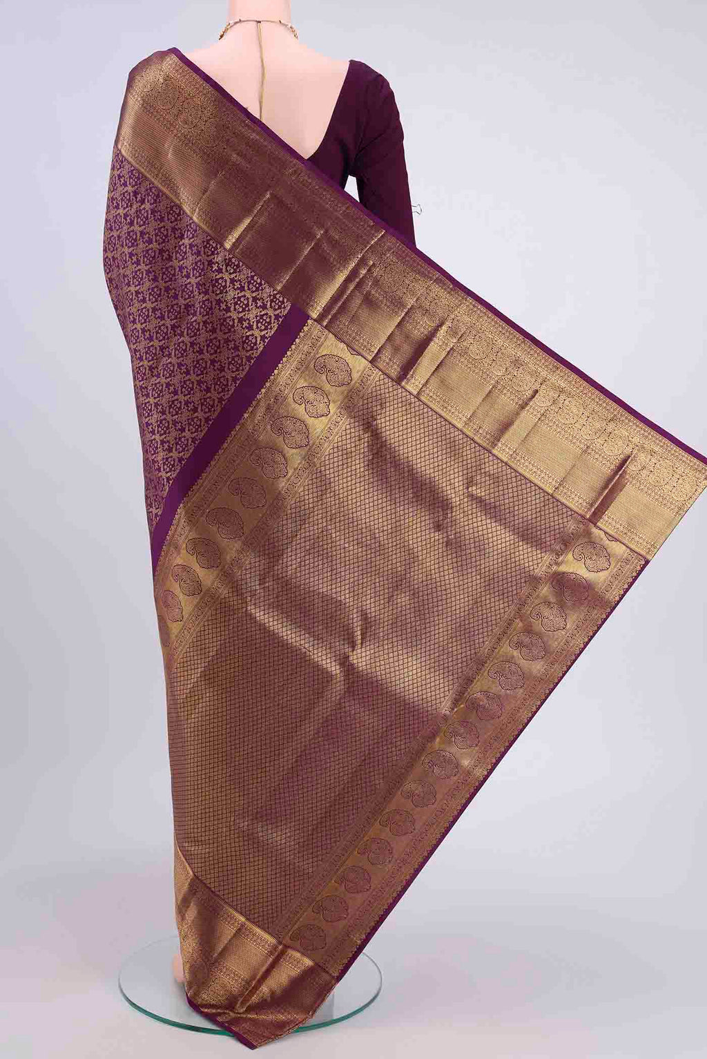 Flat view of Purple Kanchipuram Silk Saree with Zari Brocade on the body and Zari Border