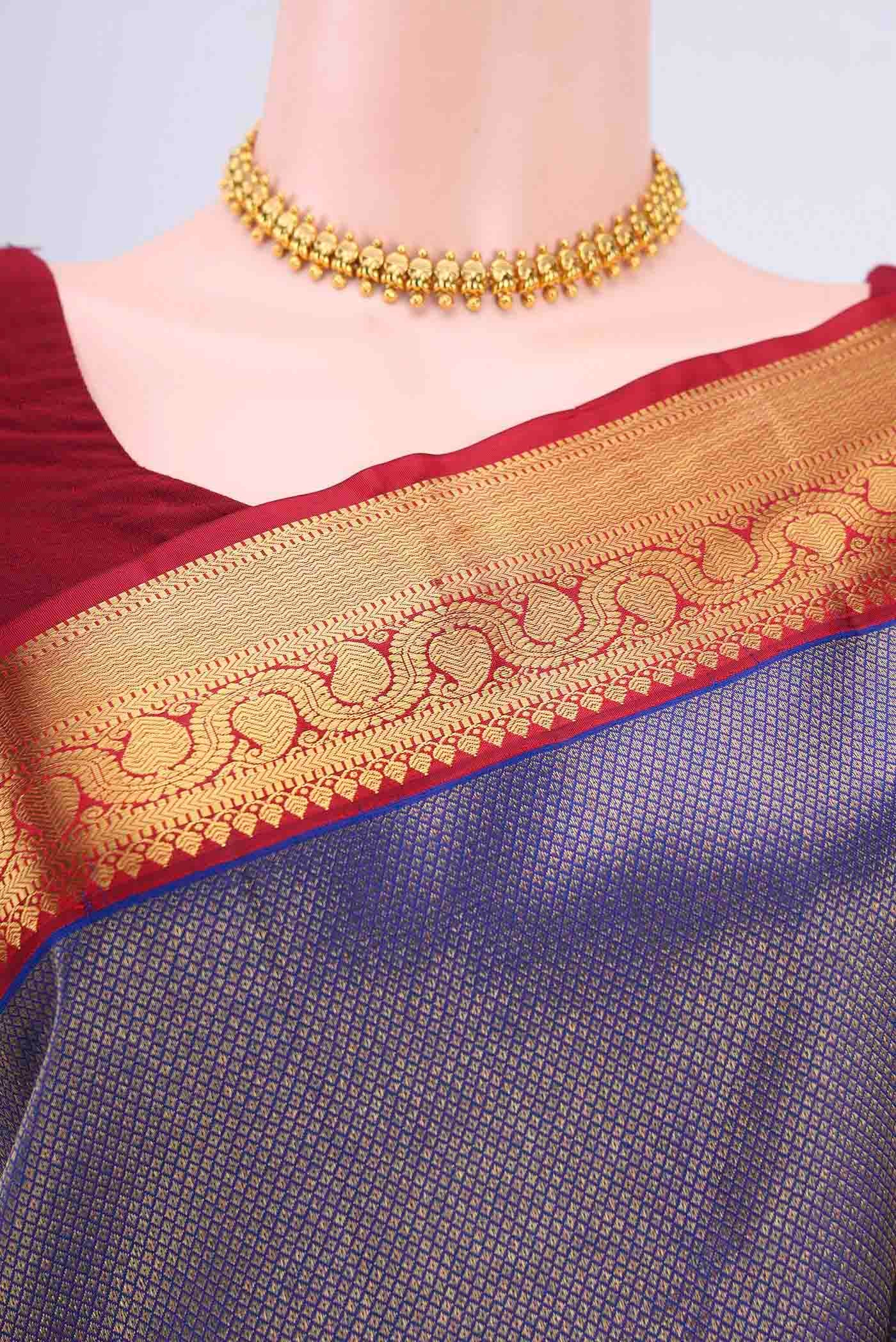 Border image of Navy Blue Kanchipuram Silk Saree with Zari Brocade on the body and Zari Border