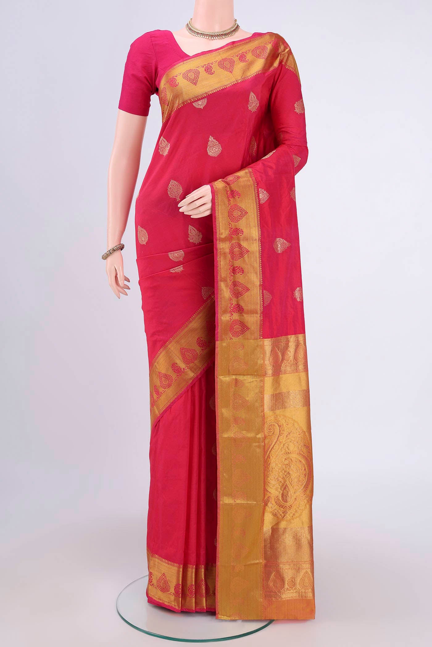 Dark Pink Blended Bangalore Silk Saree with Zari Butta on the body and Zari Border.  displayed on a mannequin