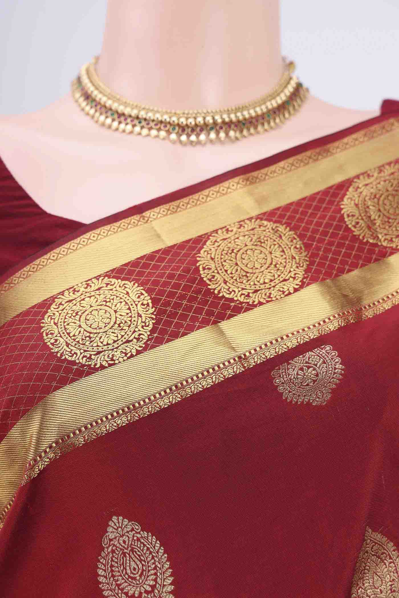 Border image of Maroon Blended Bangalore Silk Saree with Zari Butta on the body and Zari Border. 