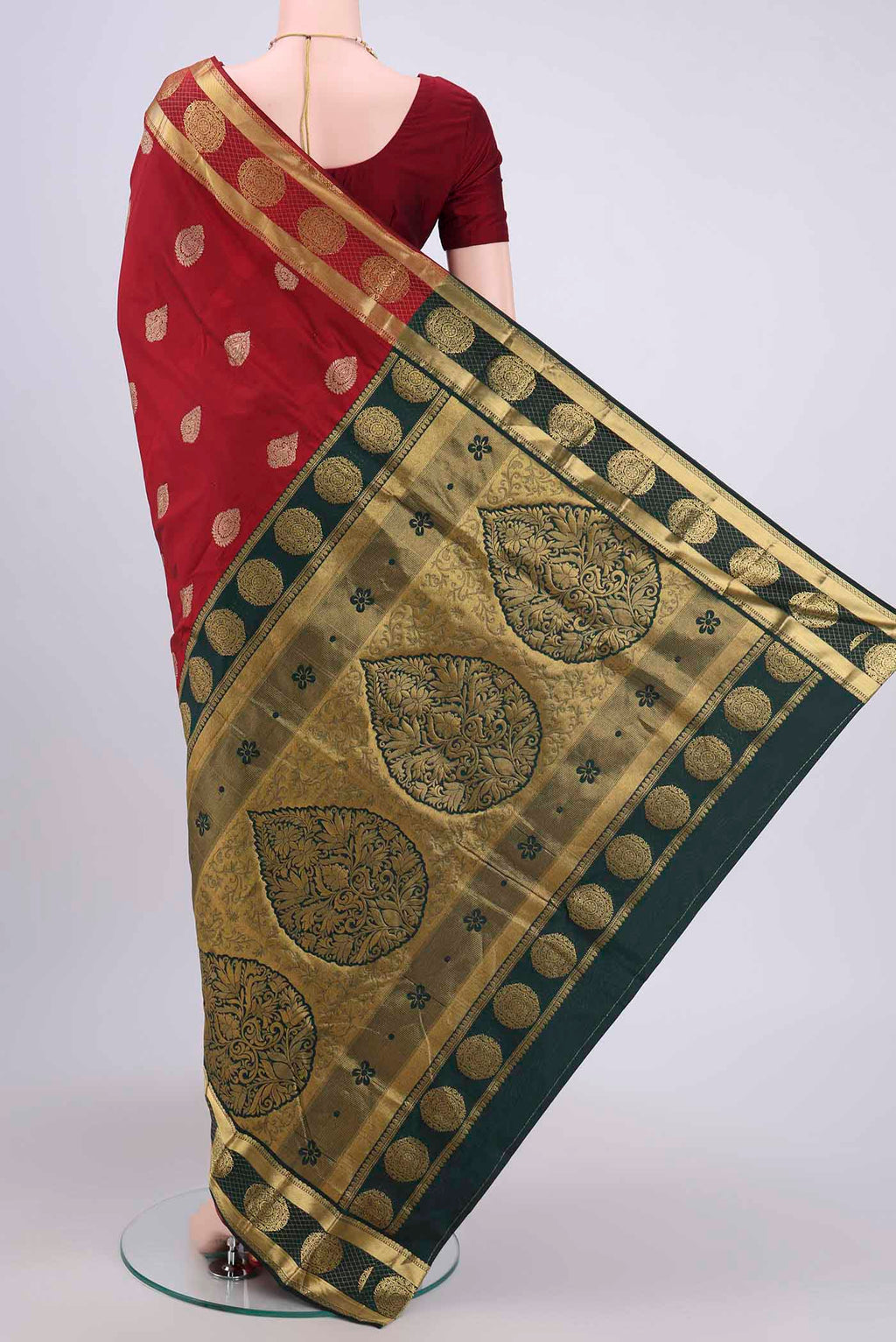 Flat view of Maroon Blended Bangalore Silk Saree with Zari Butta on the body and Zari Border. 
