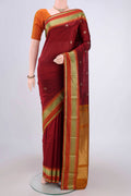 Maroon Blended Bangalore Silk Saree with Zari Butta on the body and Zari Border.  displayed on a mannequin