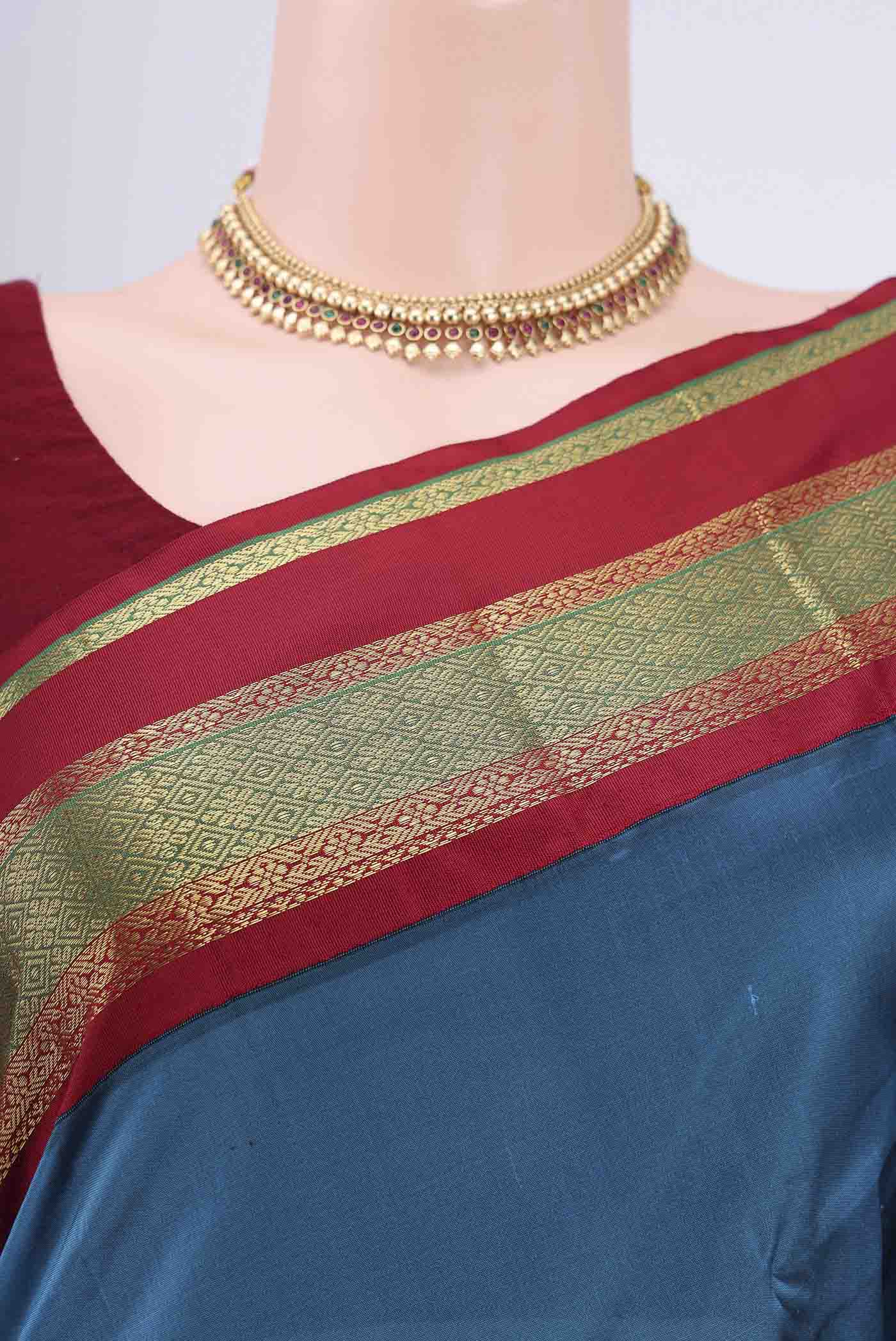 Border image of Dark Blue Blended Bangalore Silk Saree with Zari Butta on the body and Zari Border. 