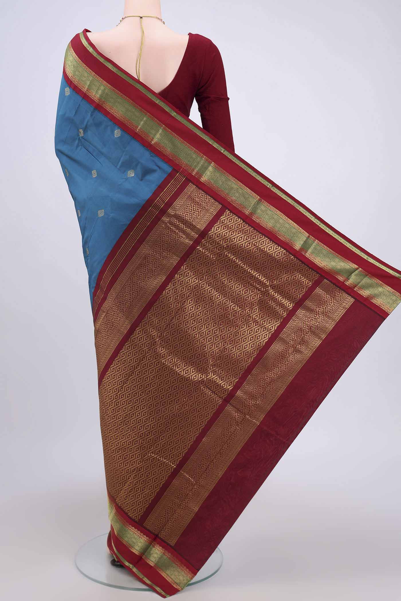 Flat view of Dark Blue Blended Bangalore Silk Saree with Zari Butta on the body and Zari Border. 