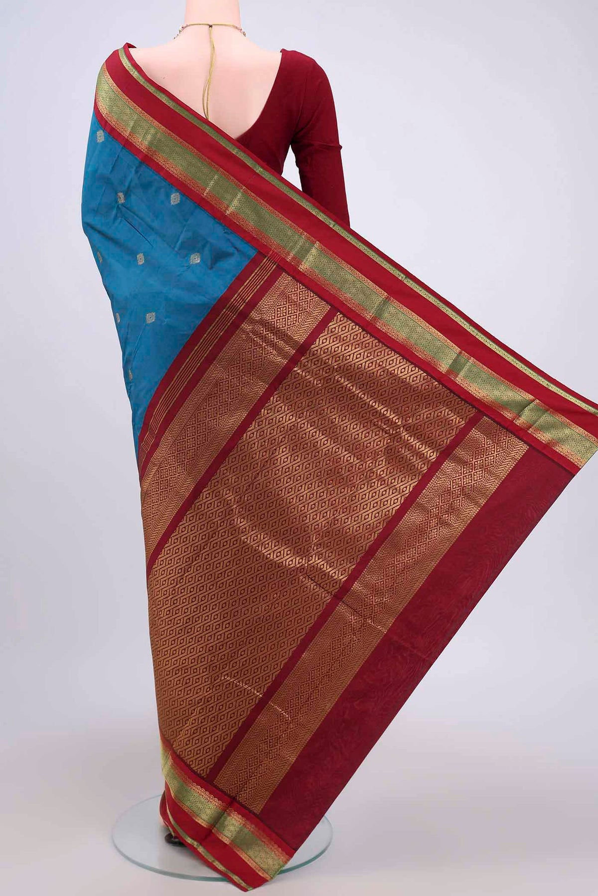 Flat view of Dark Blue Blended Bangalore Silk Saree with Zari Butta on the body and Zari Border. 