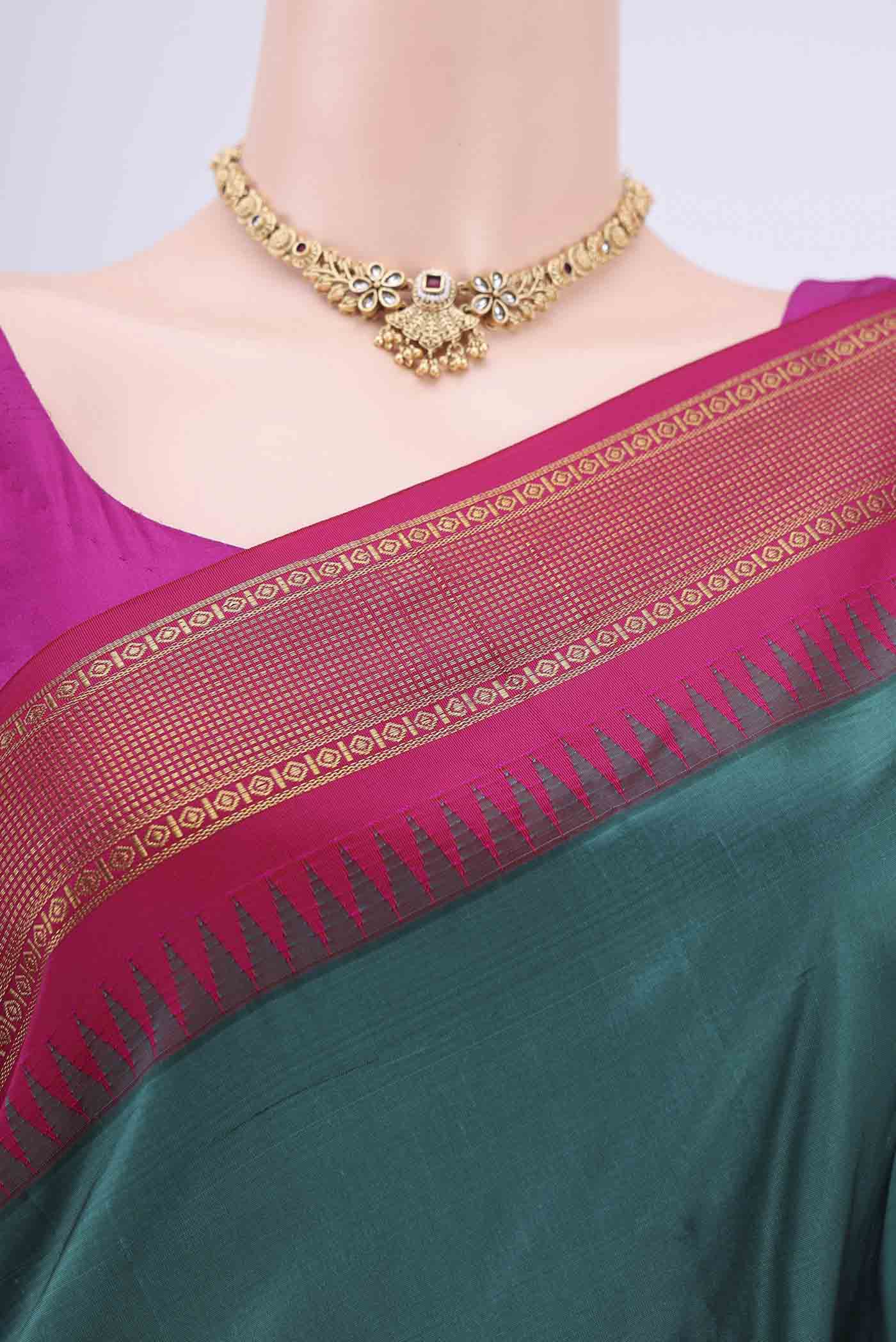 Border image of Sea Green Dual Tone Blended Bangalore Silk Saree with Zari Butta on the body and Temple Border. 
