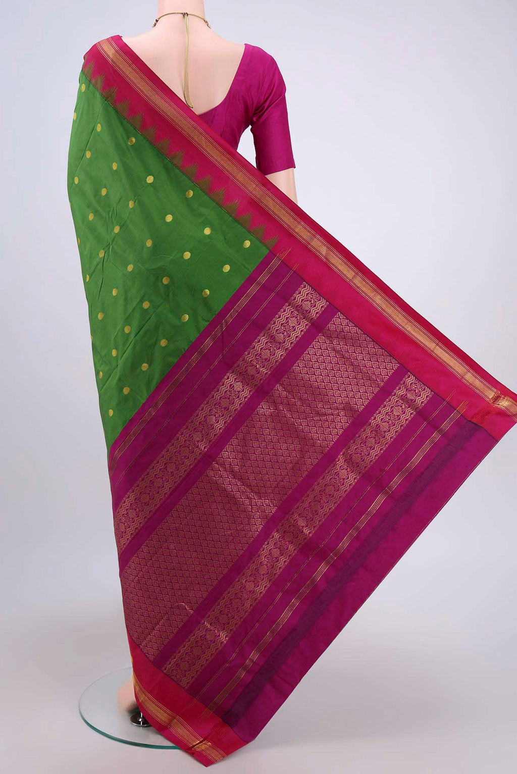Flat view of Green Dual Tone Blended Bangalore Silk Saree with Zari Butta on the body and Temple Border. 