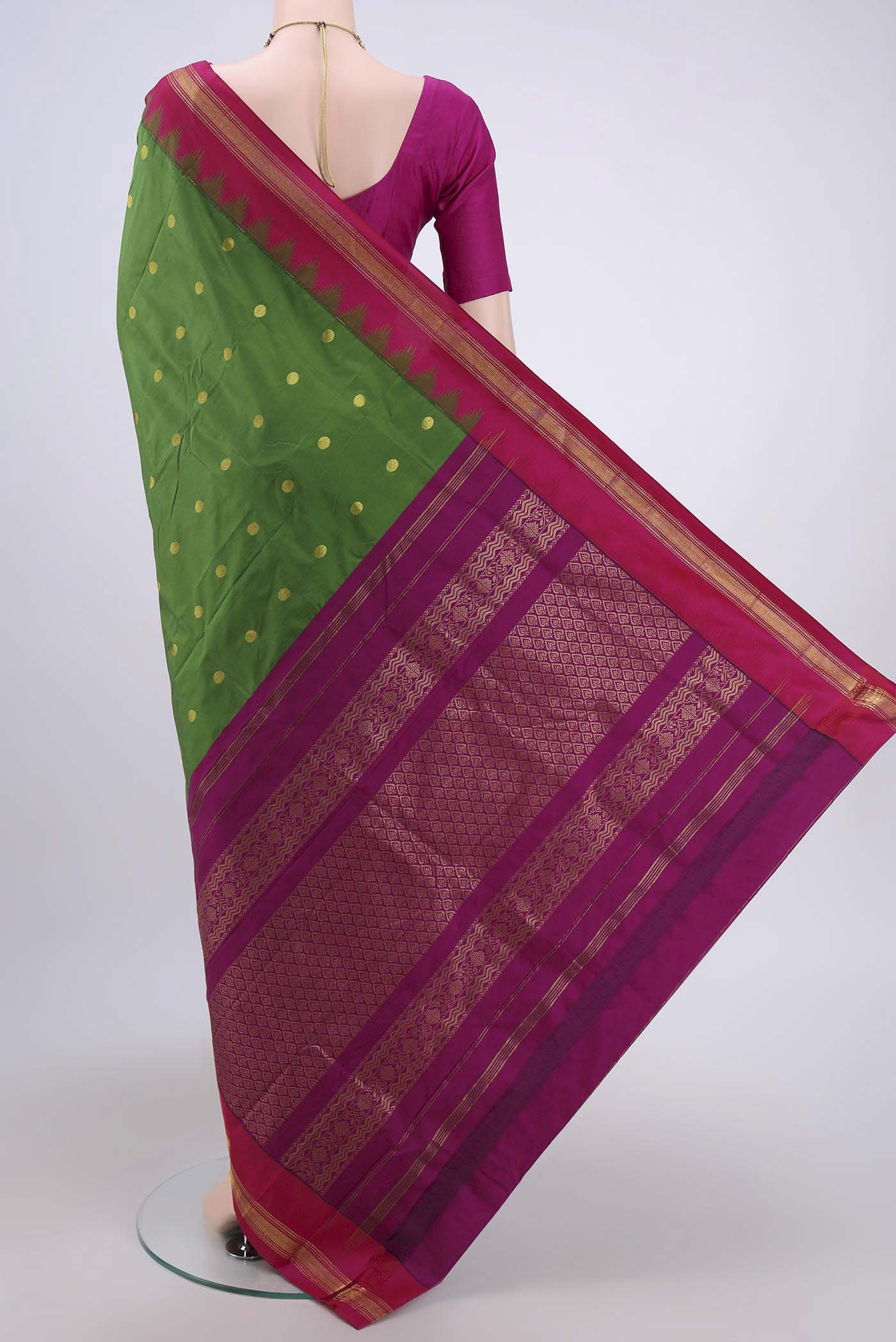 Flat view of Green Dual Tone Blended Bangalore Silk Saree with Zari Butta on the body and Temple Border. 
