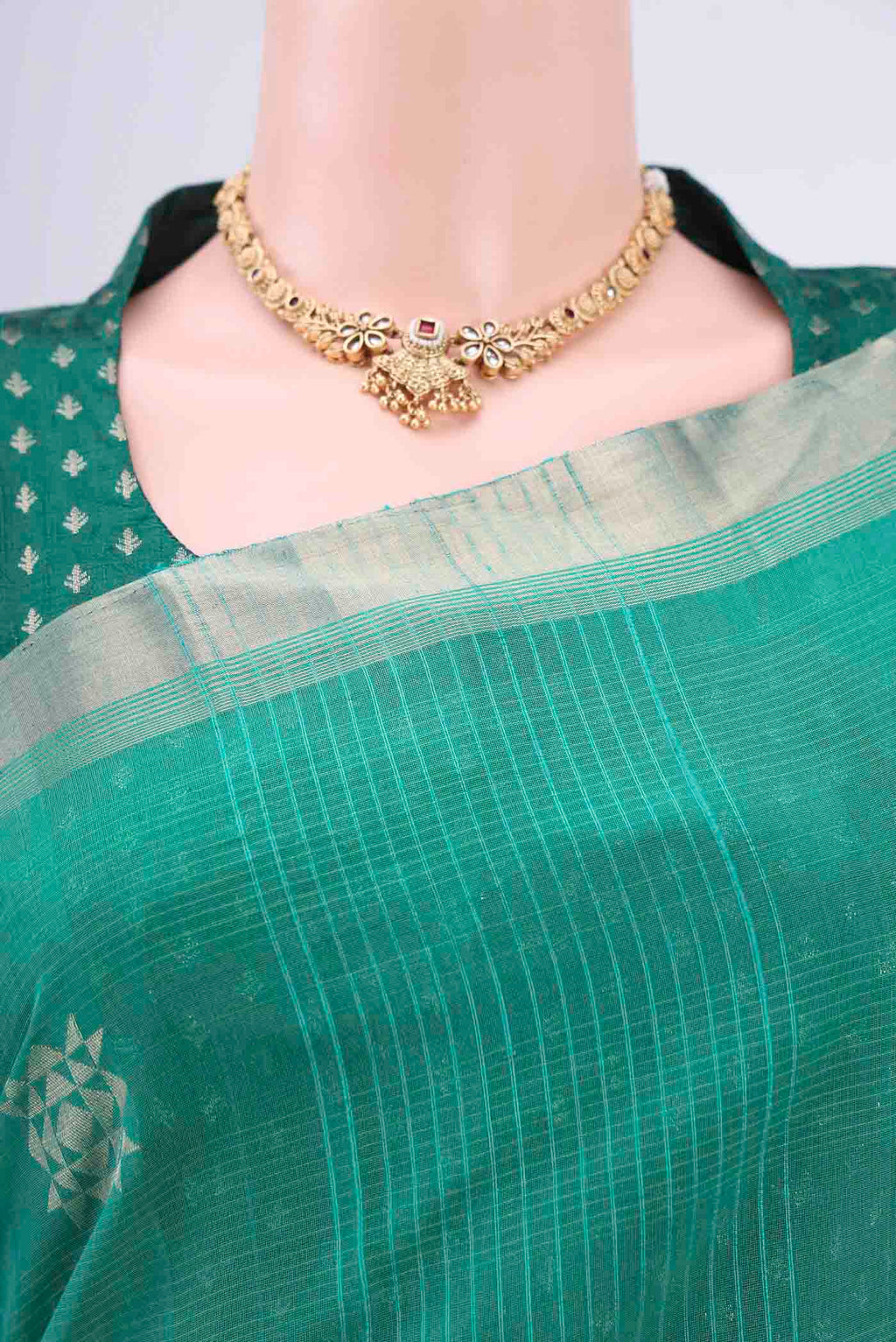 Border image of Sea Green Kora Cotton Saree with Zari Butta on the body and Zari Border. 