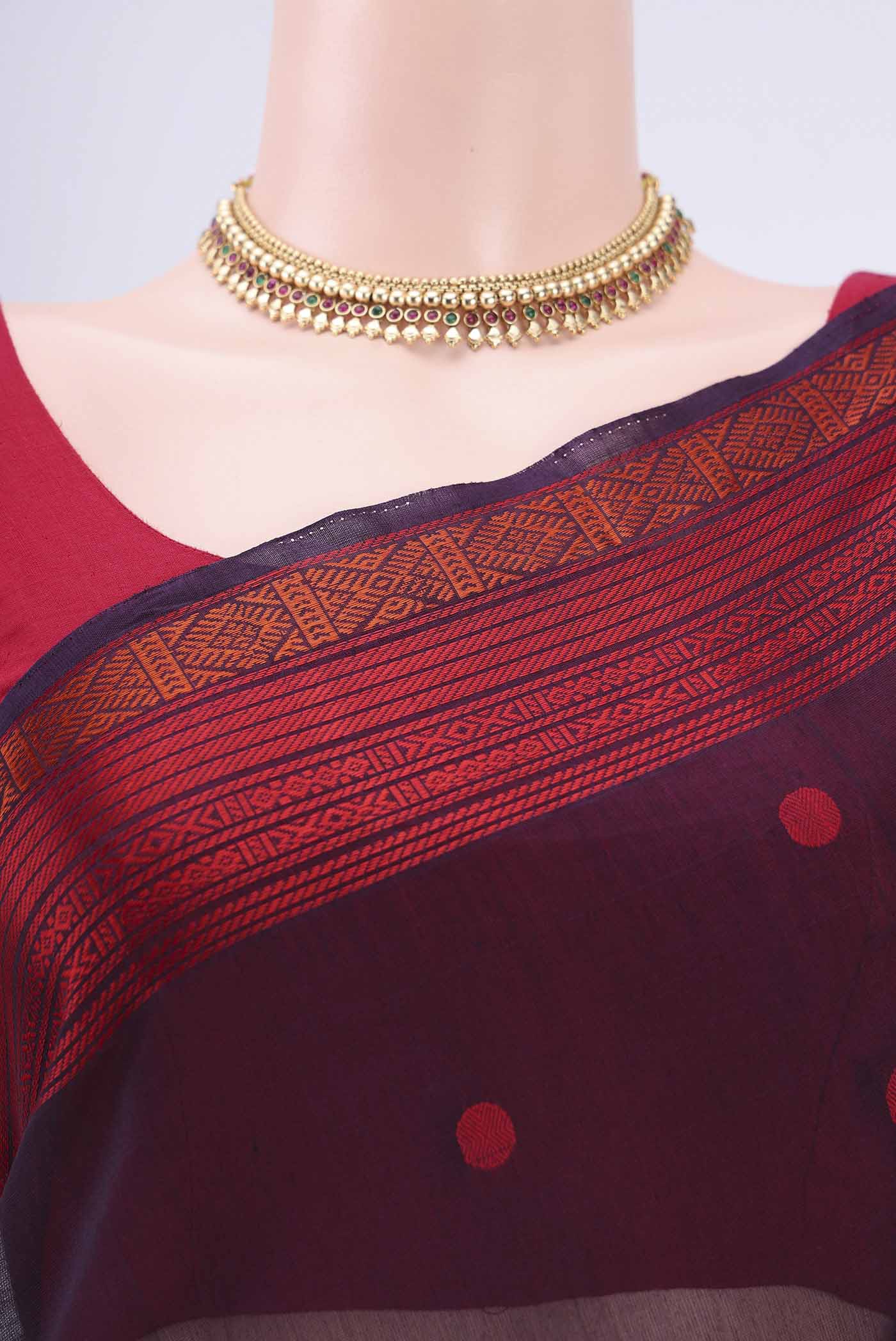 Border image of Dark Mauve Kora Cotton Saree with Zari Butta on the body and Zari Border. 