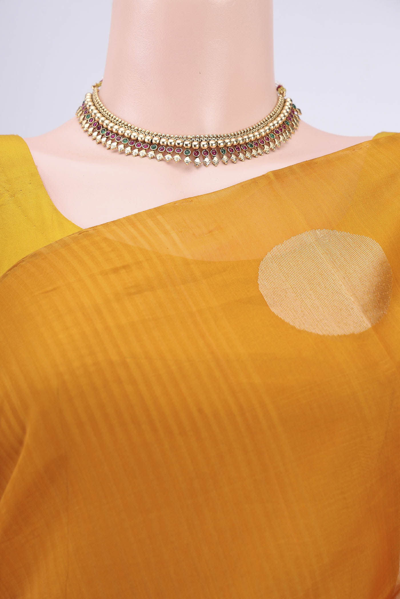 Border image of Mustard Kora Cotton Saree with Zari Butta on the body and Zari Border. 