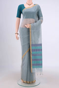 Blue Grey Silk Cotton Saree with Plain Body and Zari Border.  displayed on a mannequin