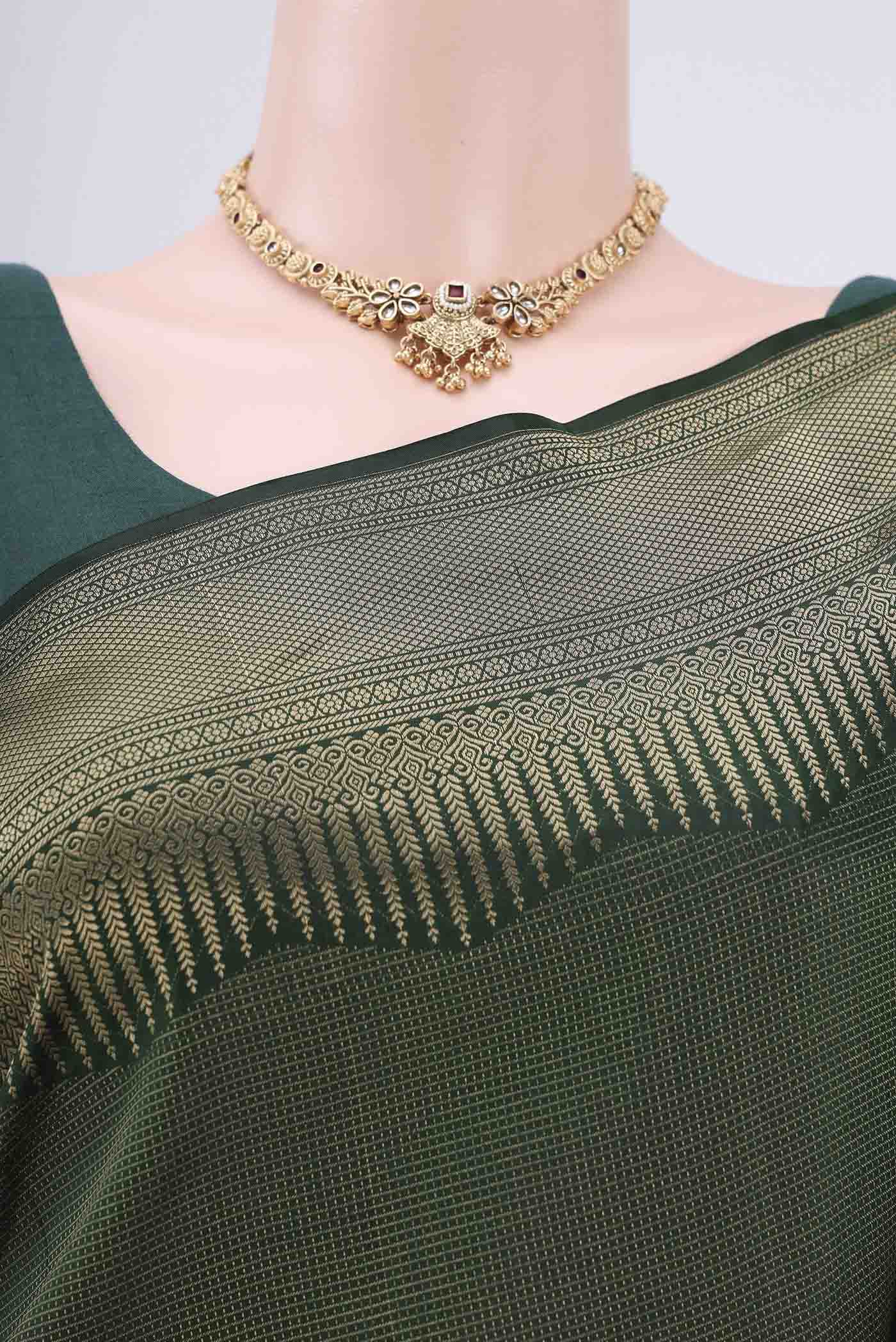 Border image of Bottle Green Soft Silk Saree with Checked design on the body and Zari Border. 