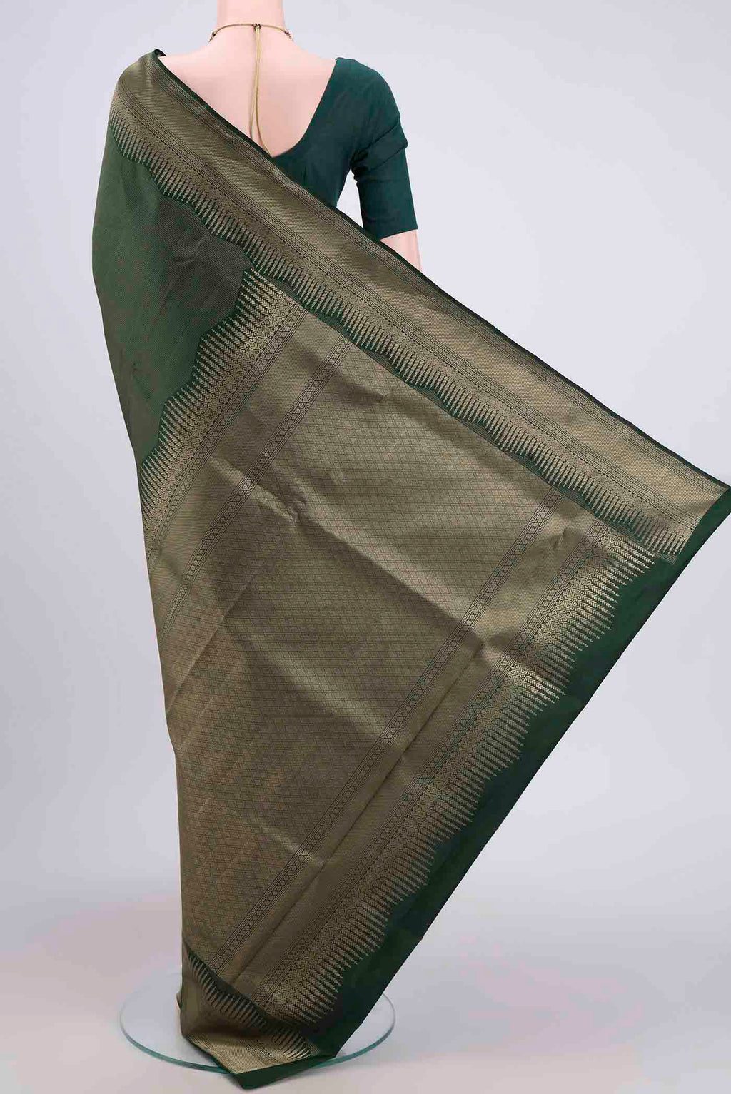 Flat view of Bottle Green Soft Silk Saree with Checked design on the body and Zari Border. 