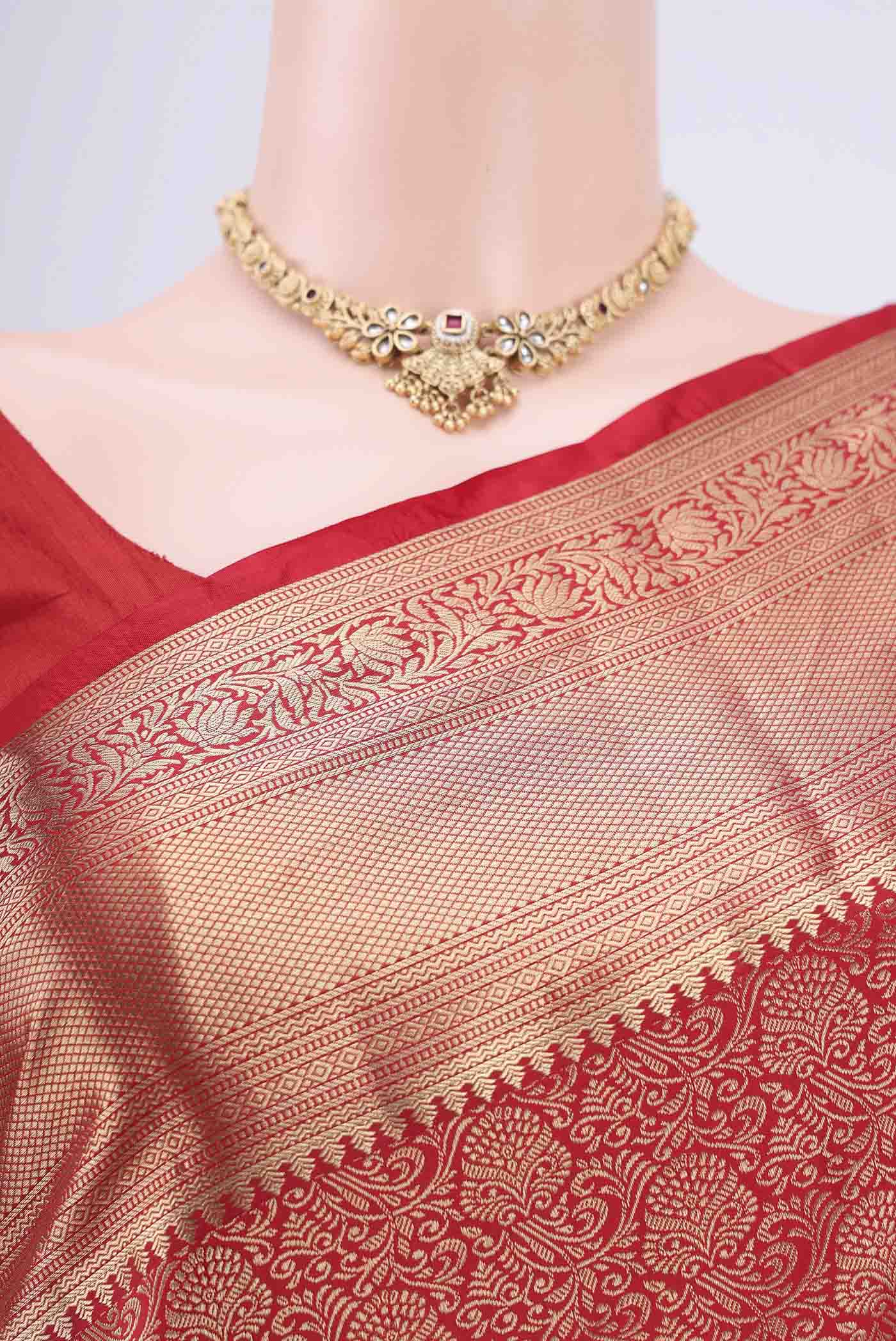 Border image of Red Soft Silk Saree with Zari Brocade on the body and Zari Border. 