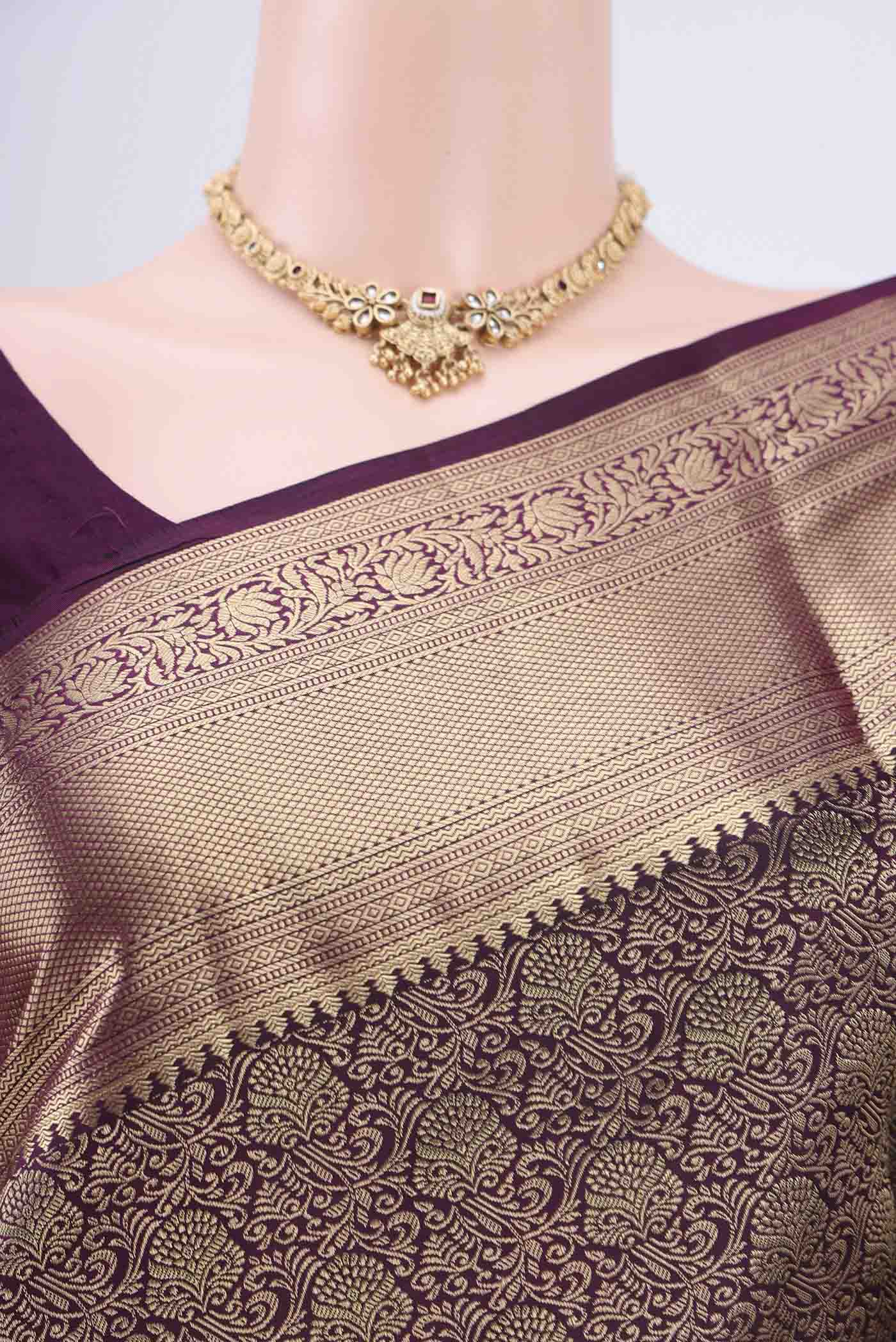 Border image of Dark Mauve Soft Silk Saree with Zari Brocade on the body and Zari Border. 