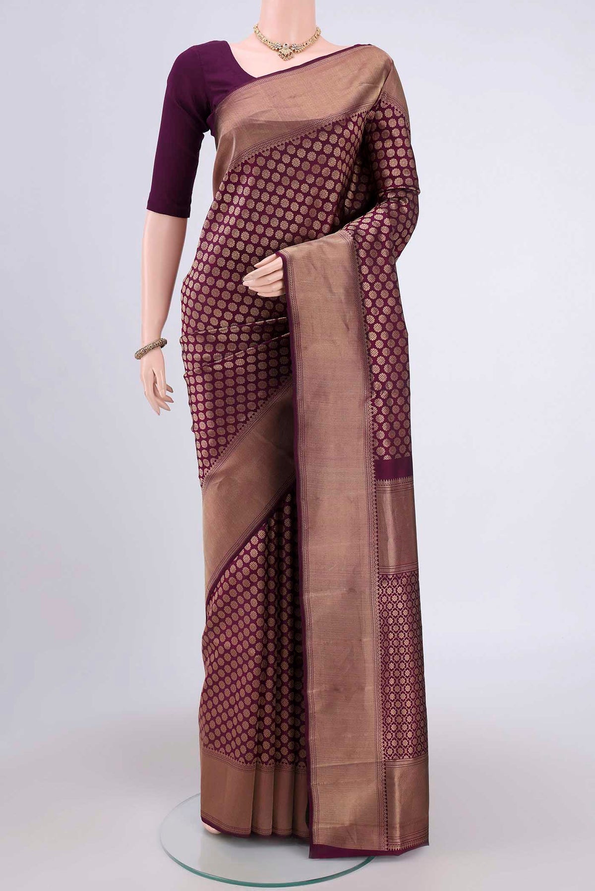 Purple Soft Silk Saree with Zari Brocade on the body and Zari Border.  displayed on a mannequin