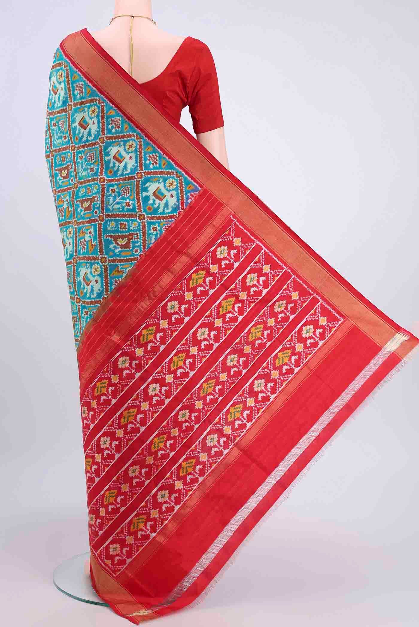 Flat view of Blue Pochampally Silk Saree with Pure Ikat on the body and Zari Border