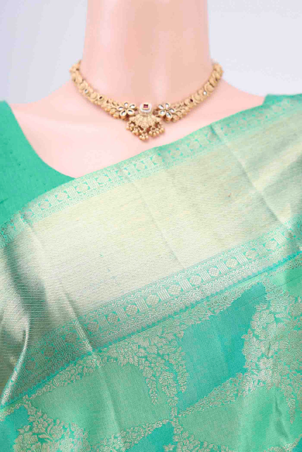 Border image of Mint Green Dual Tone Kanchipuram Saree with Zari Brocade on the body and Zari Border