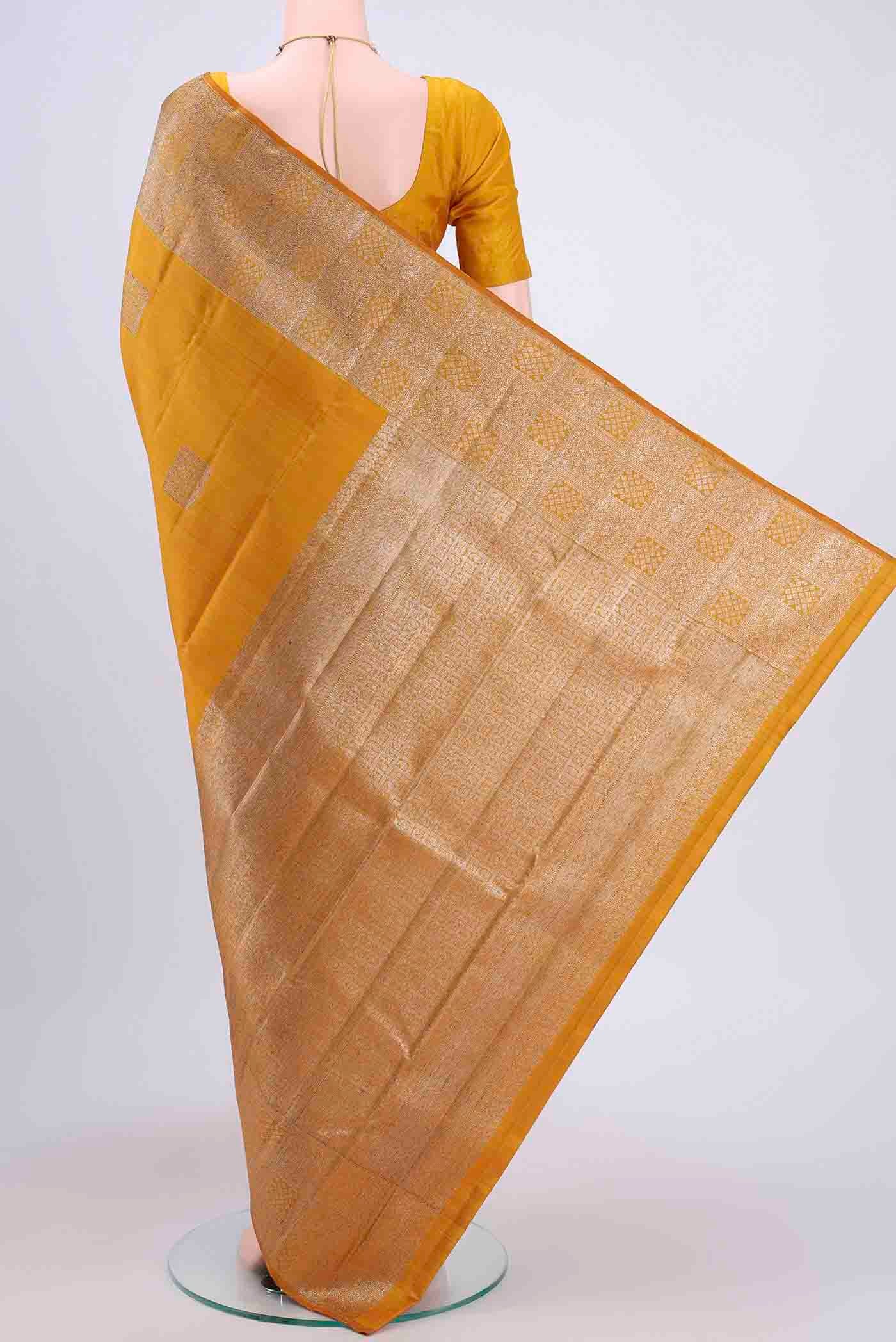 Flat view of Mustard Dual Tone Kanchipuram Saree with Zari Butta on the body and Zari Border