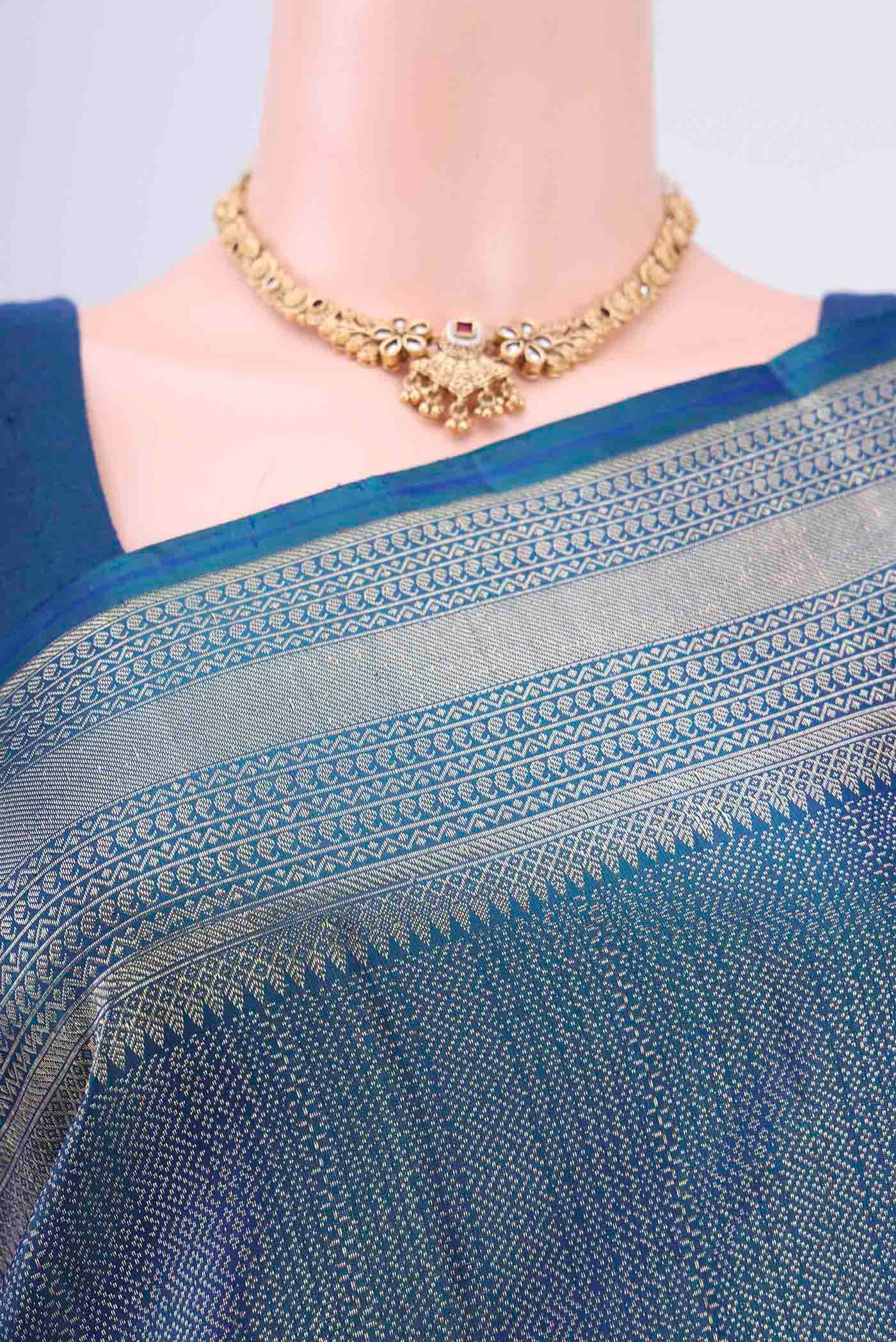 Border image of Blue Dual Tone Kanchipuram Saree with Zari Brocade on the body and Meenakari Border