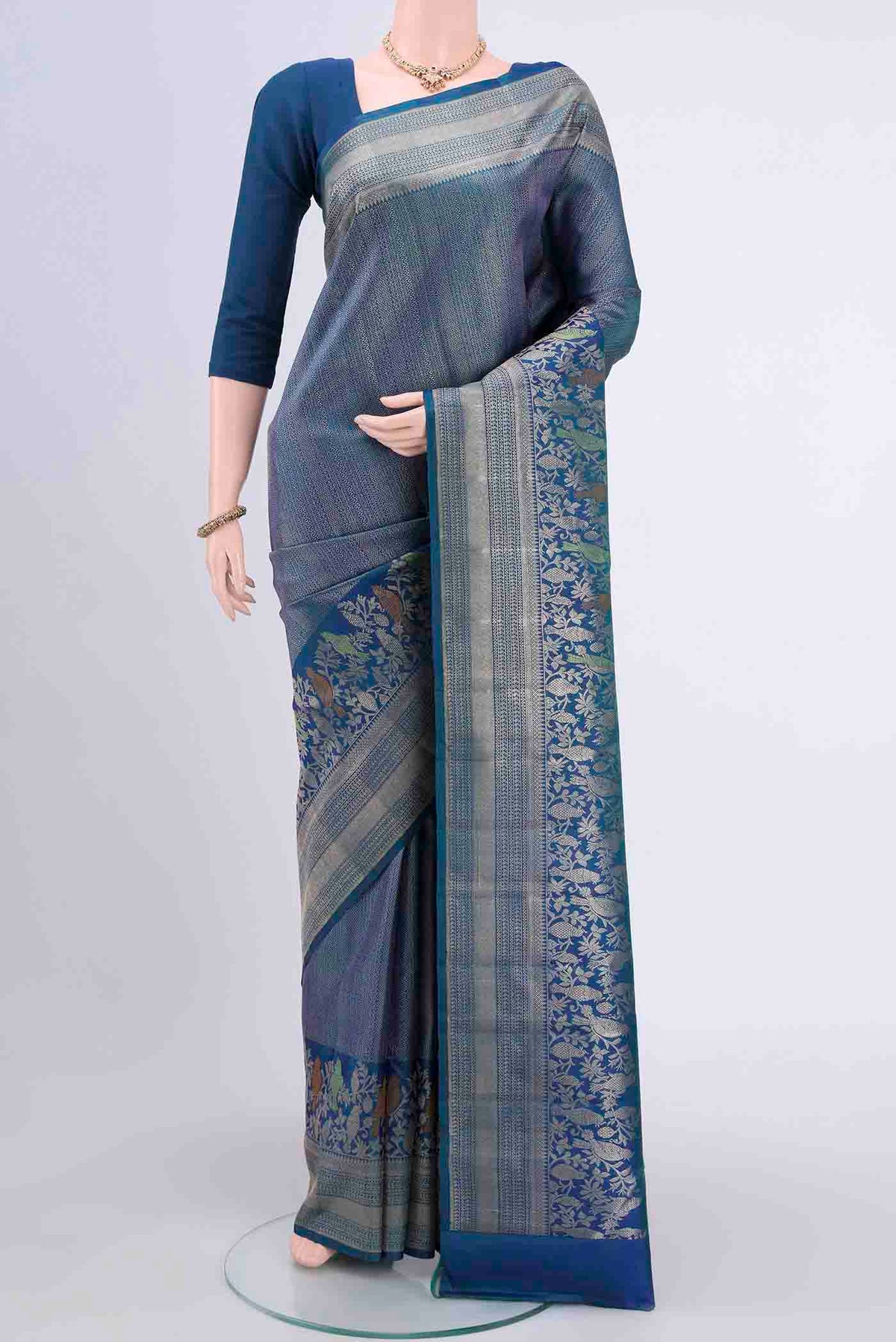 Blue Dual Tone Kanchipuram Saree with Zari Brocade on the body and Meenakari Border displayed on a mannequin