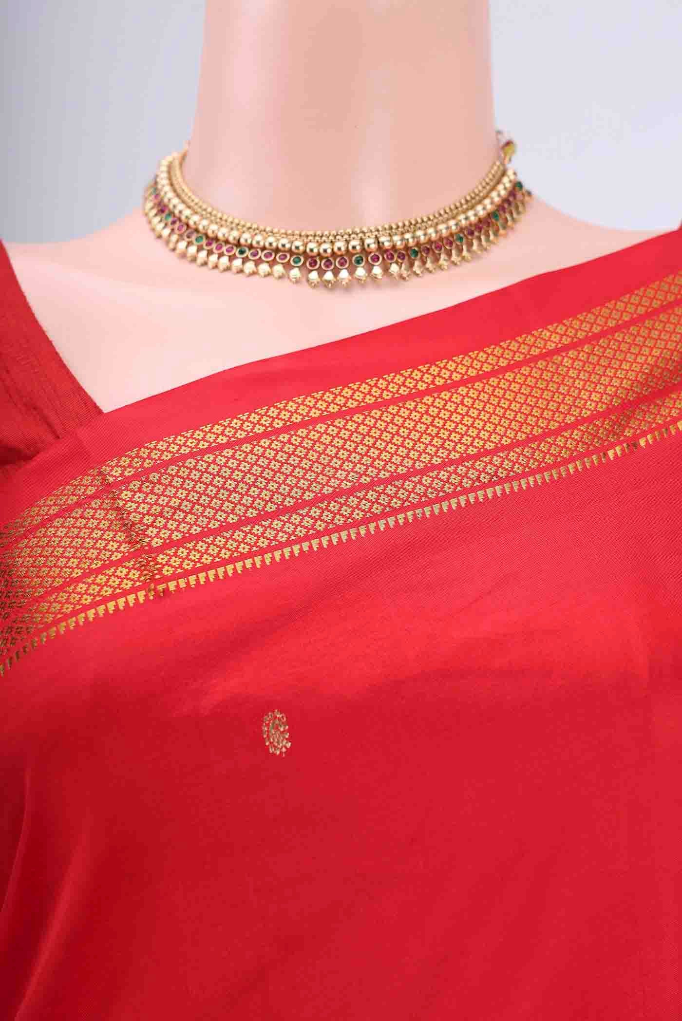 Border image of Red Paithani Silk Saree with Zari Butta on the body and Zari Border. 
