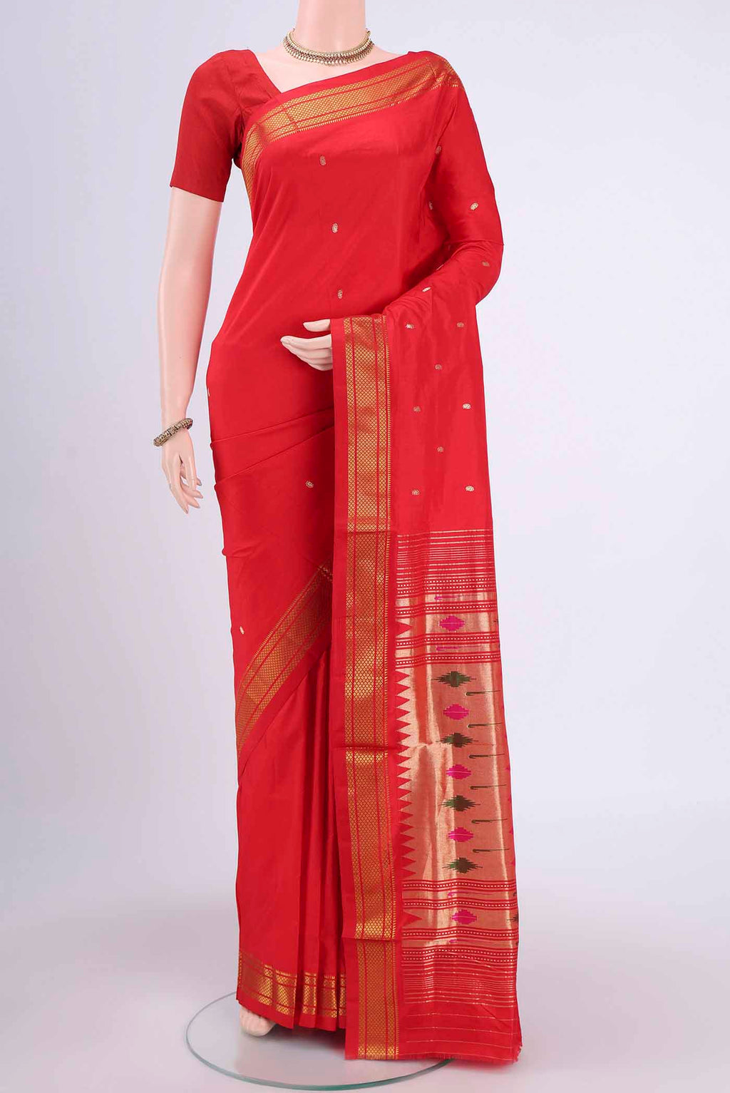 Red Paithani Silk Saree with Zari Butta on the body and Zari Border.  displayed on a mannequin