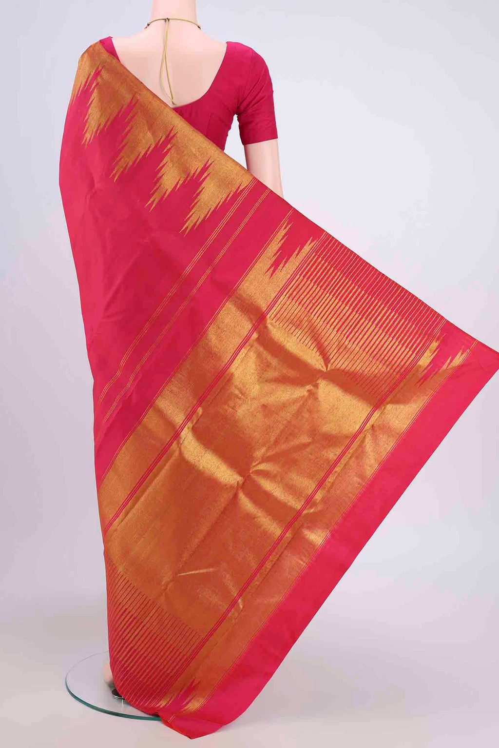 Flat view of Pure Silk Pure Zari Pink Kanjivaram Saree with Plain Body and Temple Border. 