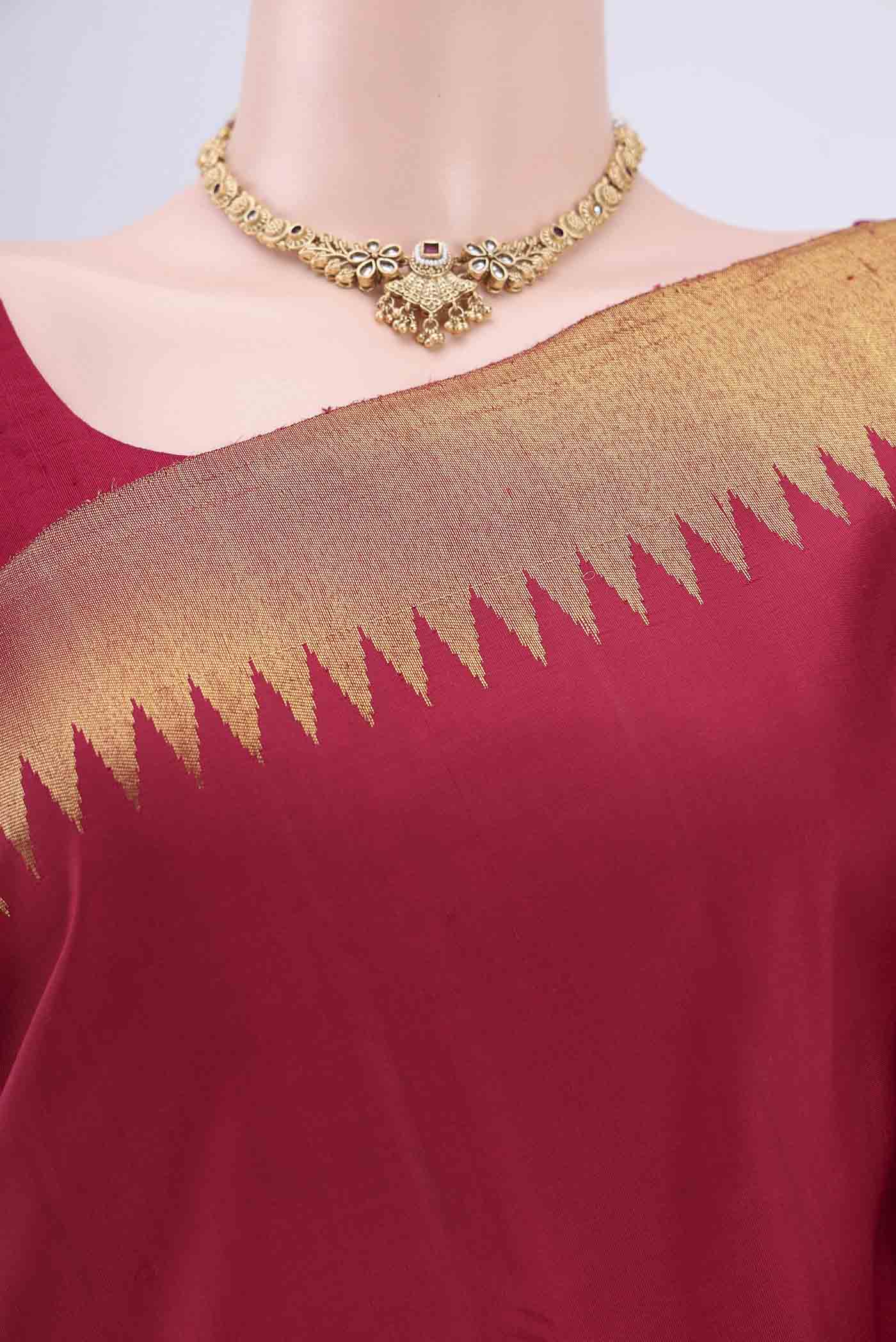 Border image of Maroon Dual Tone Kanjivaram Saree with Plain Body and Fancy Border. 