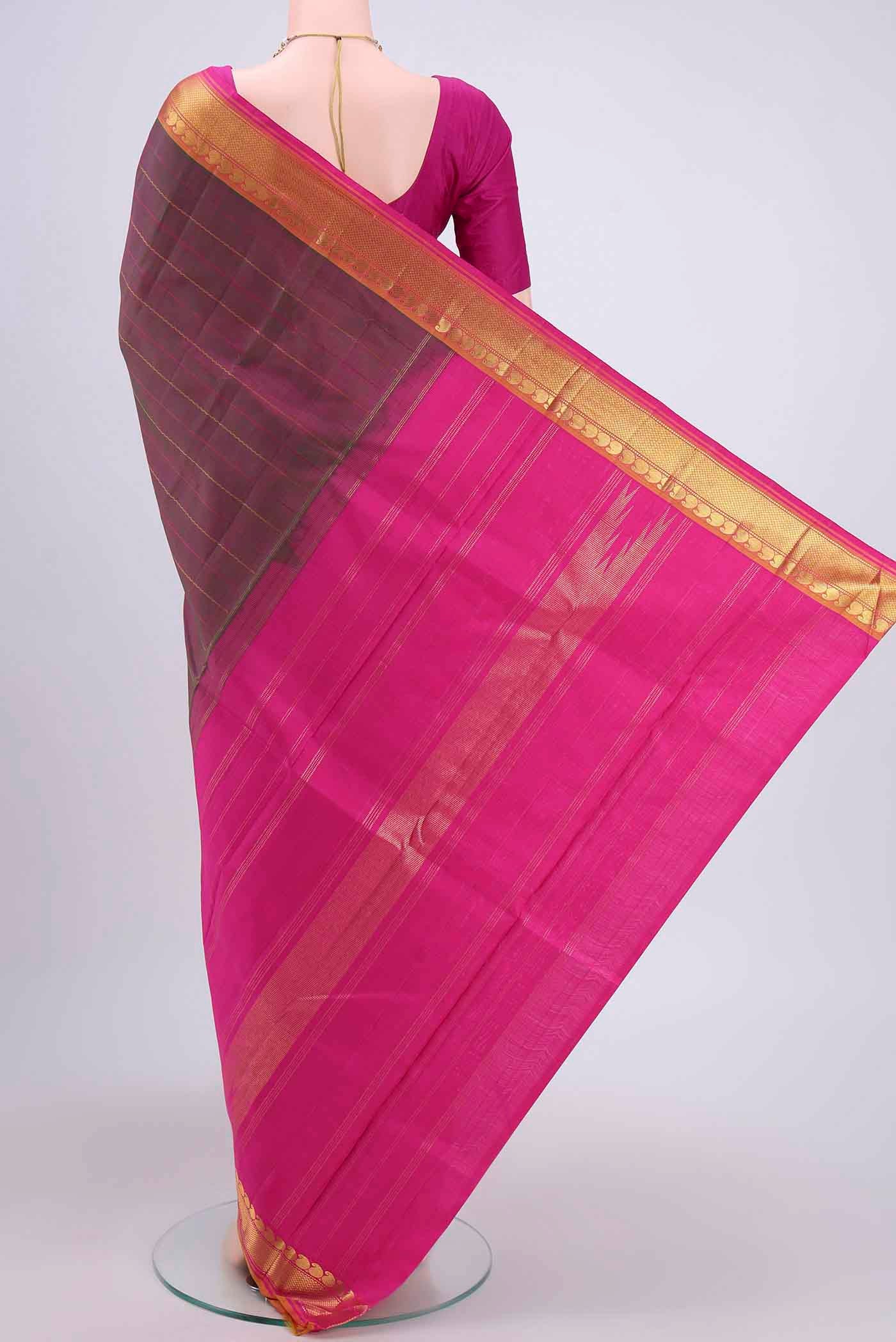 Flat view of Light Magenta Kanchipuram Saree with Stripes on the body and Zari Border. 