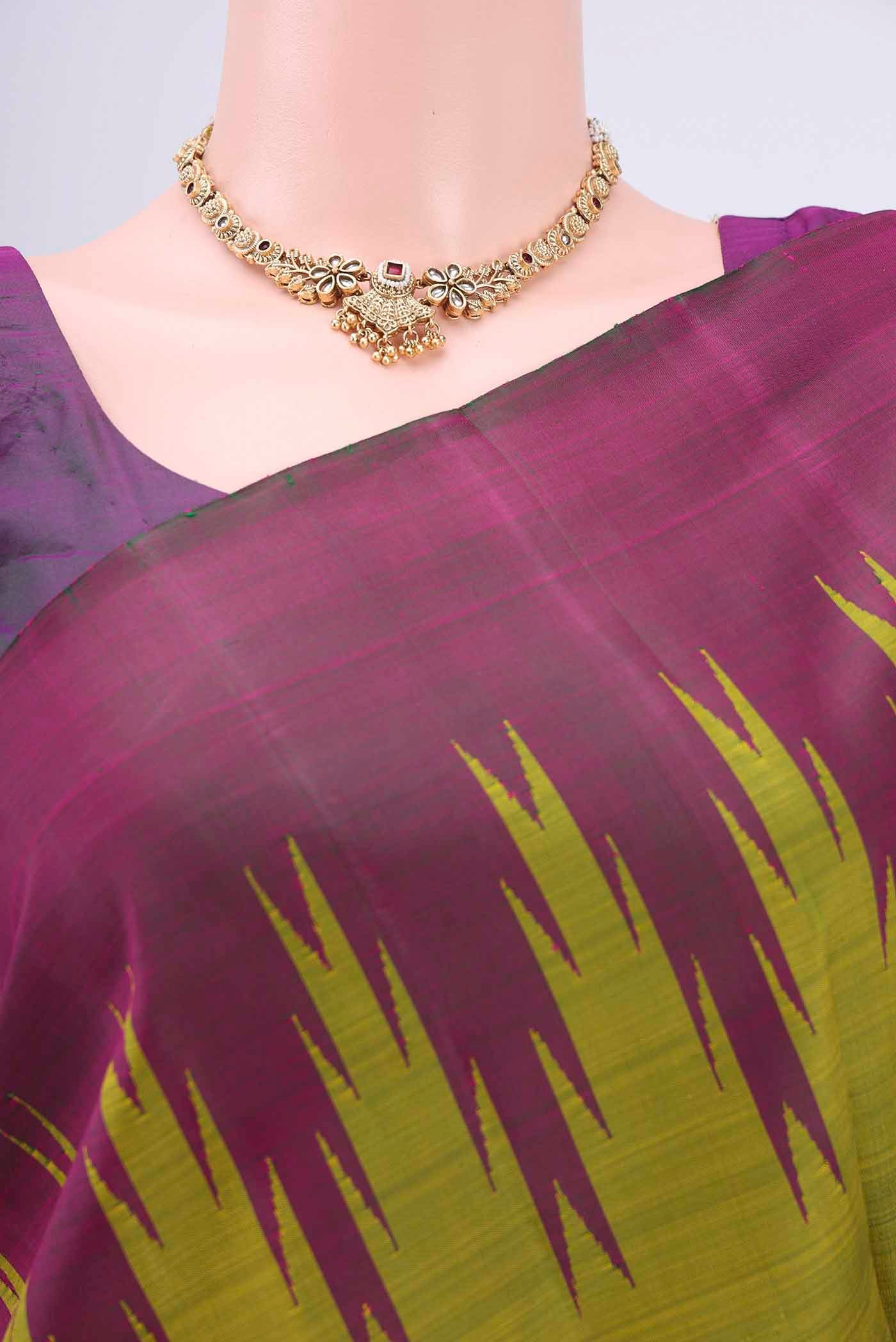 Border image of Light Green Kanchipuram Saree with Plain Body and Temple Border