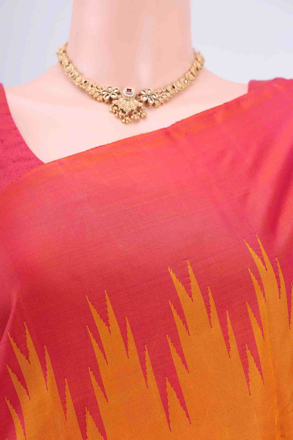 Border image of Mustard Kanchipuram Saree with Plain Body and Temple Border. 