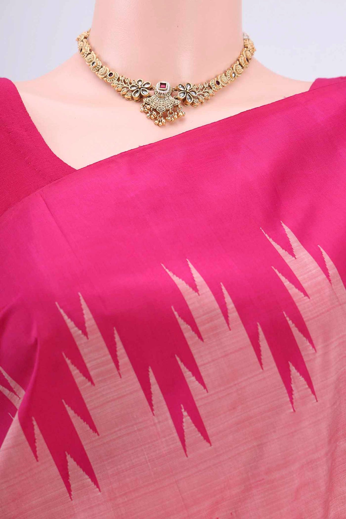 Border image of Peach Kanchipuram Saree with Plain Body and Temple Border