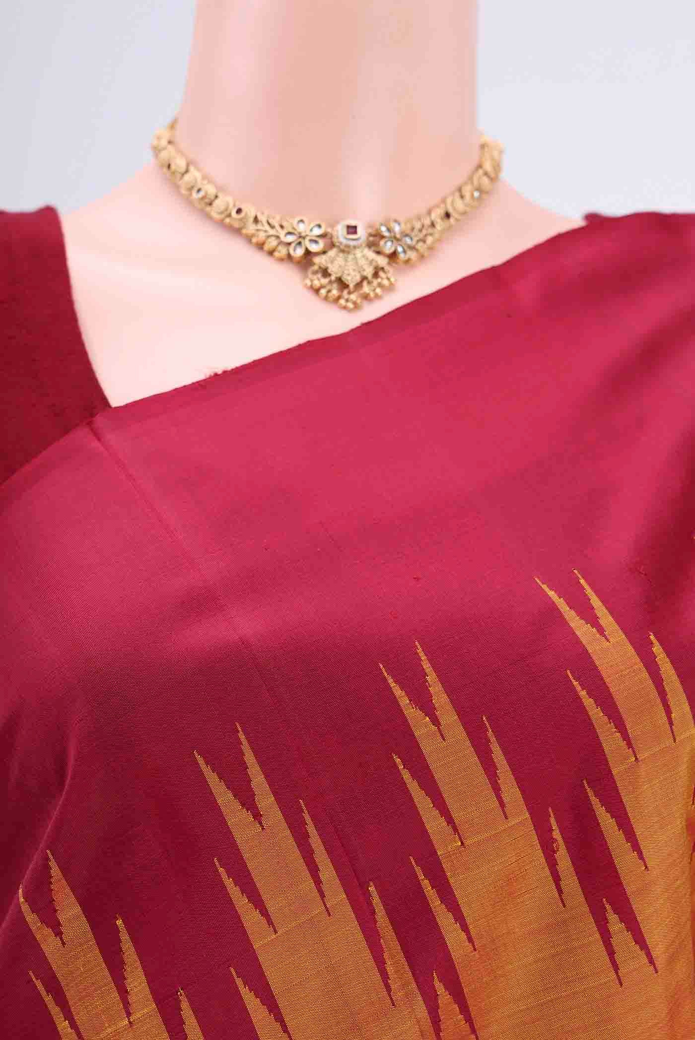 Border image of Mustard Kanchipuram Saree with Plain Body and Temple Border
