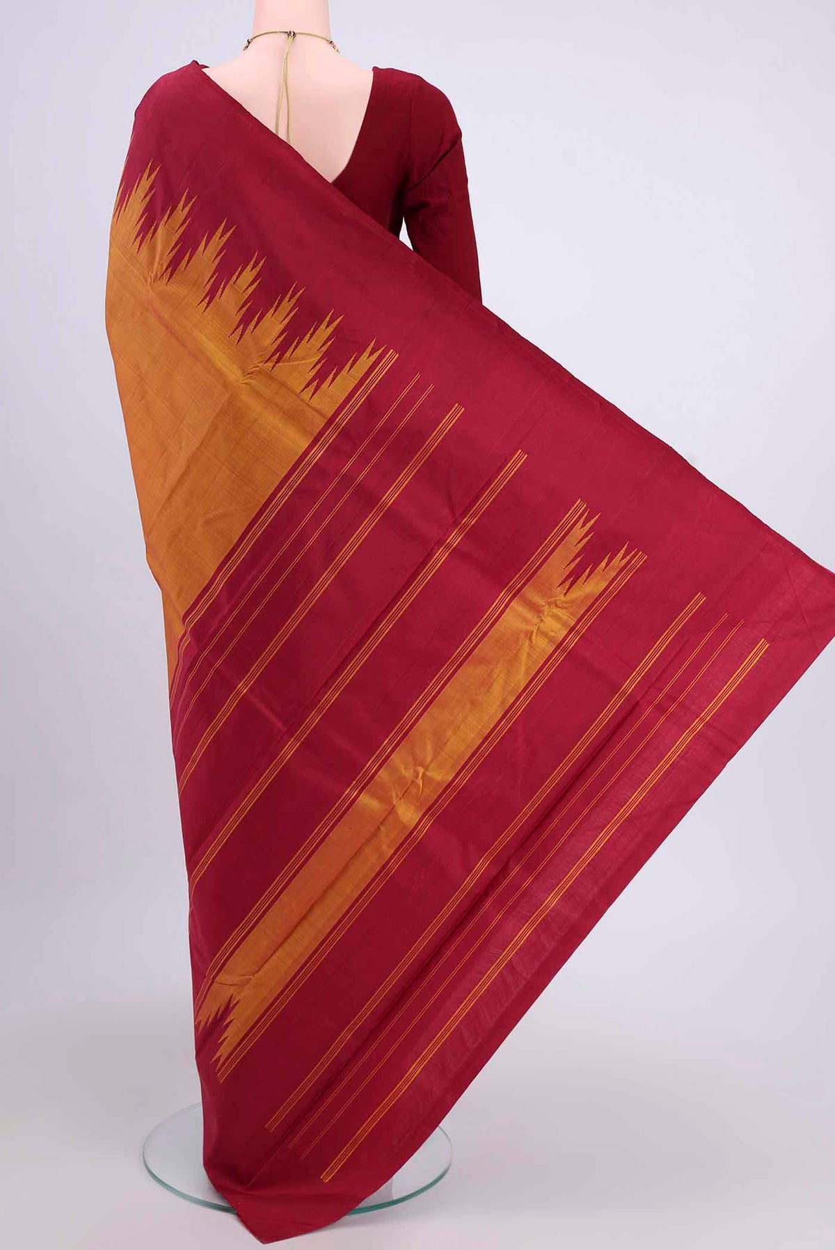 Flat view of Mustard Kanchipuram Saree with Plain Body and Temple Border