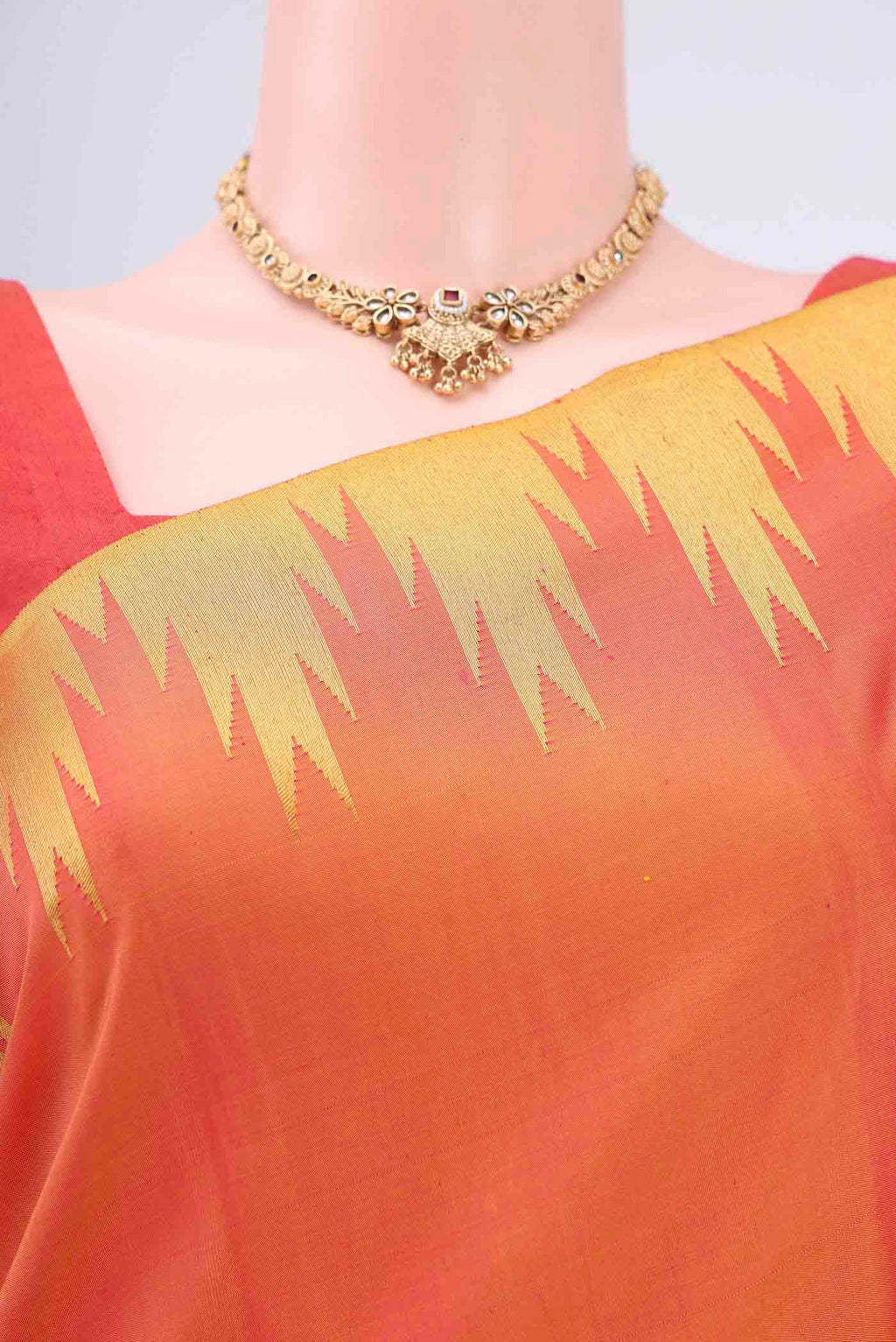 Border image of Pure Silk Pure Zari Brick Orange Dual Tone Kanchipuram Saree with Plain Body and Temple Border. 