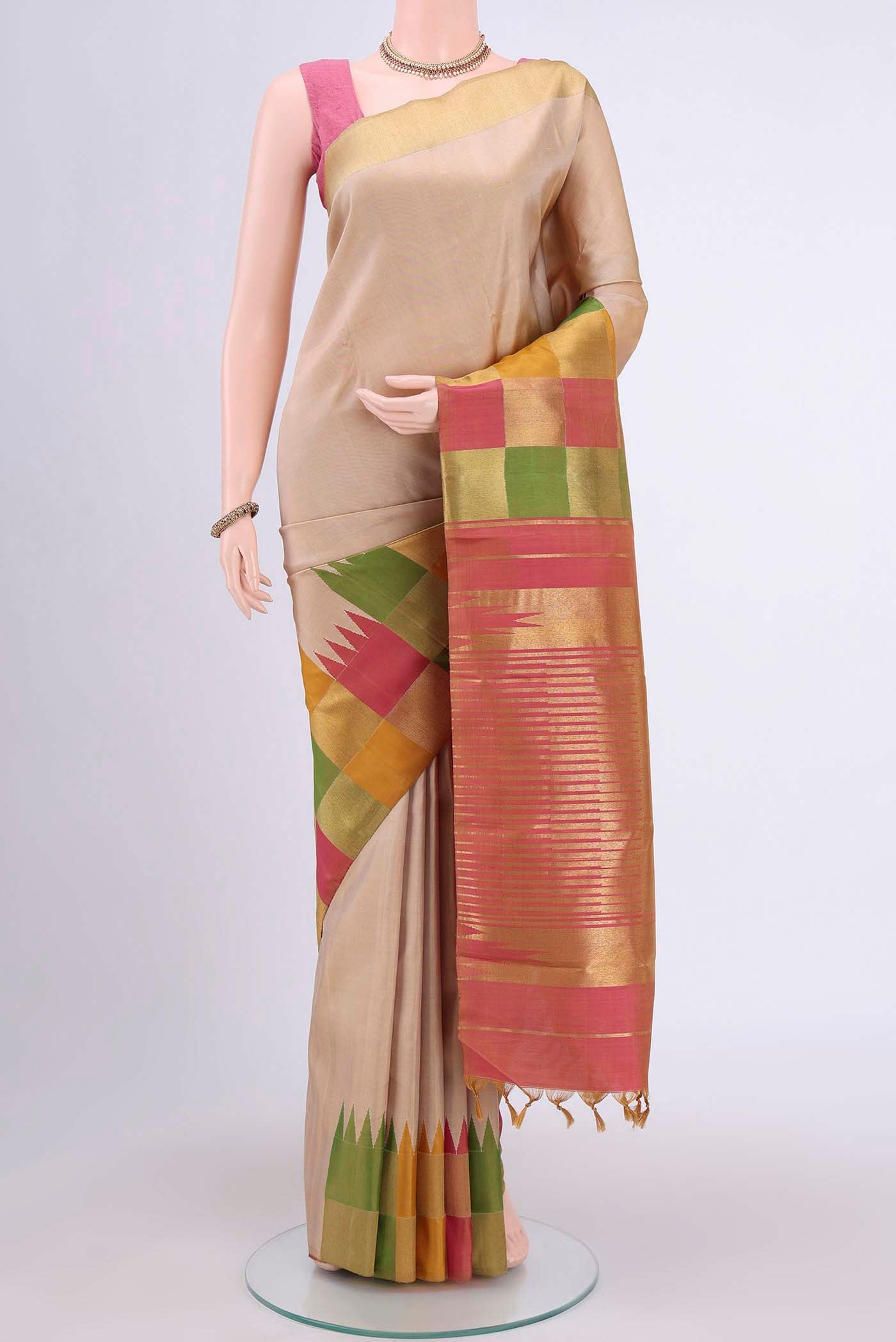 Pure Silk Pure Zari Beige Kanjivaram Saree with Plain Body and Checks Border.  displayed on a mannequin