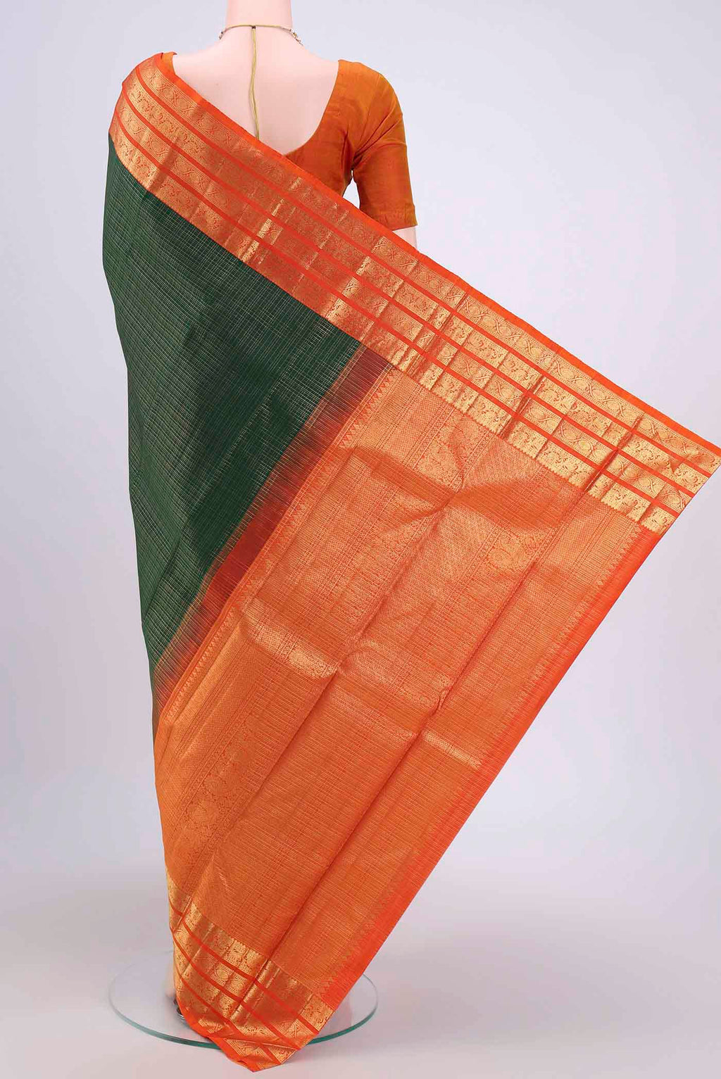 Flat view of Bottle Green Dual Tone Kanchipuram Saree with Checked design on the body and Zari Border. 