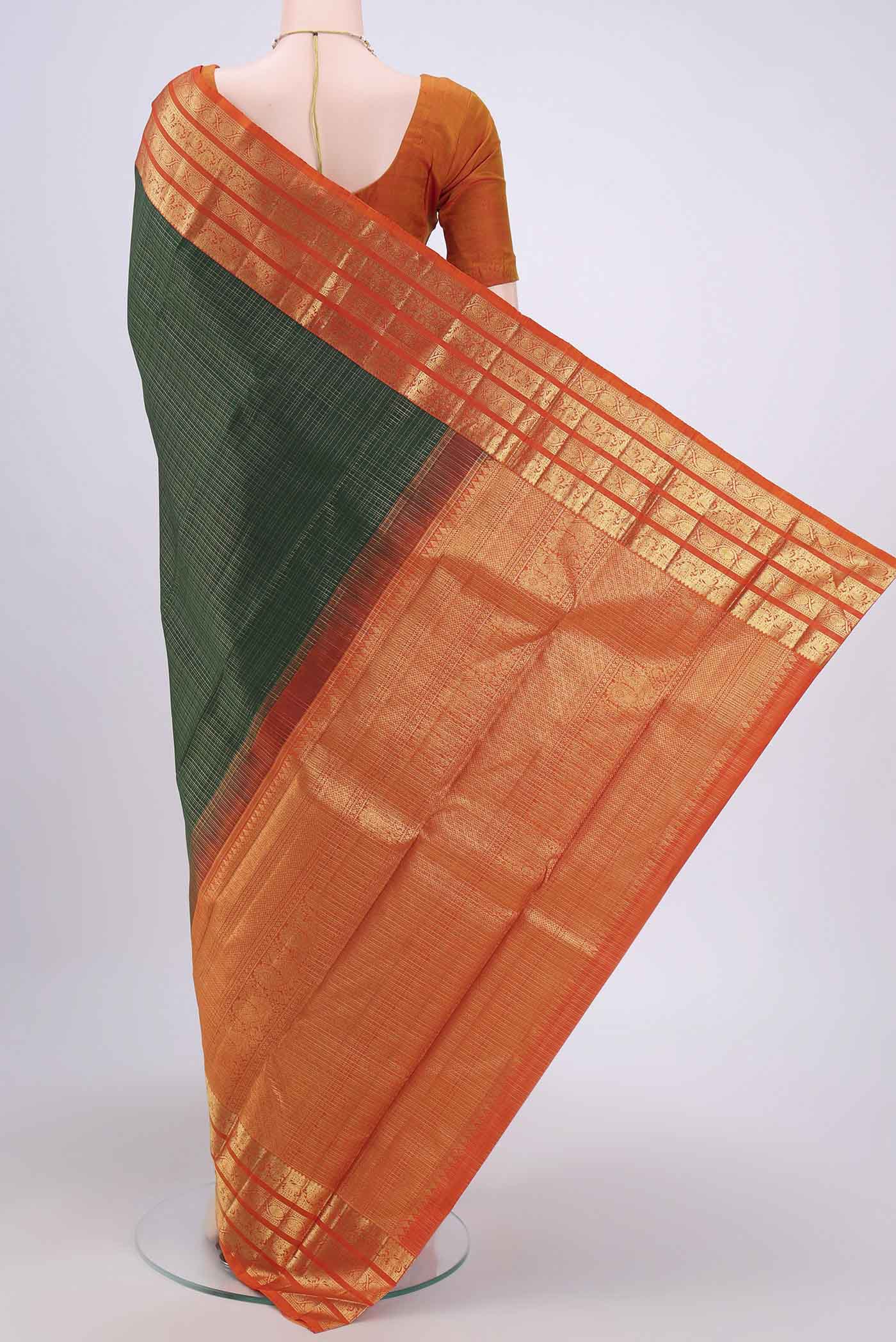 Flat view of Bottle Green Dual Tone Kanchipuram Saree with Checked design on the body and Zari Border. 