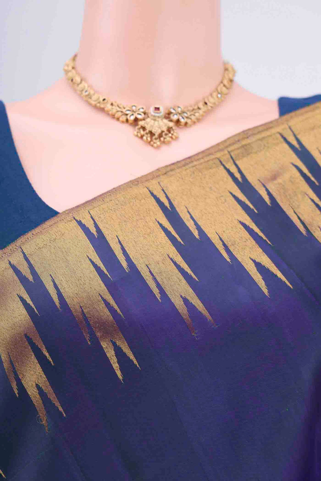 Border image of Peacock Blue Kanjivaram Saree with Plain Body and Temple Border. 