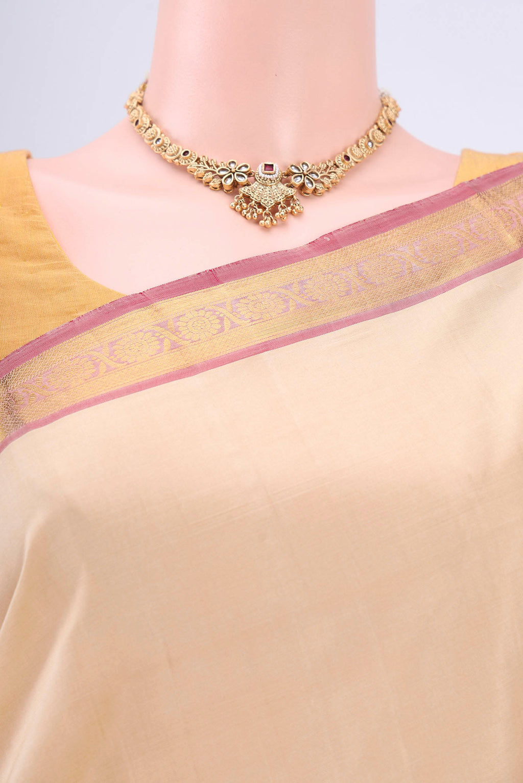 Border image of Beige Dual Tone Kanjivaram Saree with Plain Body and Zari Border. 