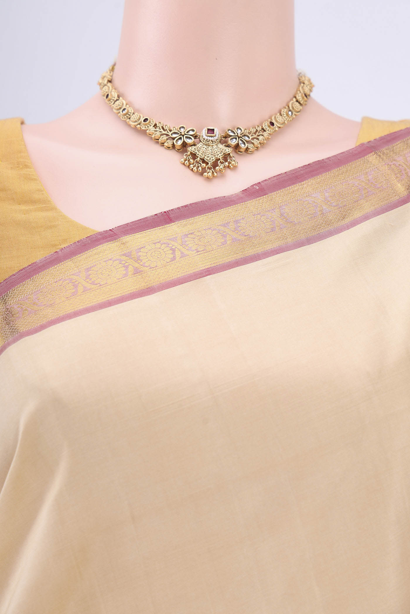 Border image of Beige Dual Tone Kanjivaram Saree with Plain Body and Zari Border. 