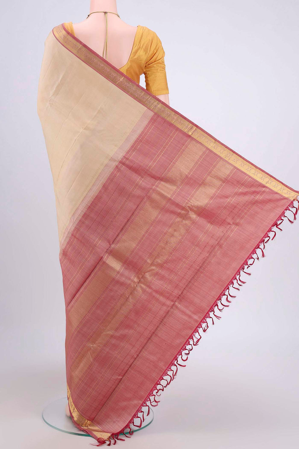 Flat view of Beige Dual Tone Kanjivaram Saree with Plain Body and Zari Border. 
